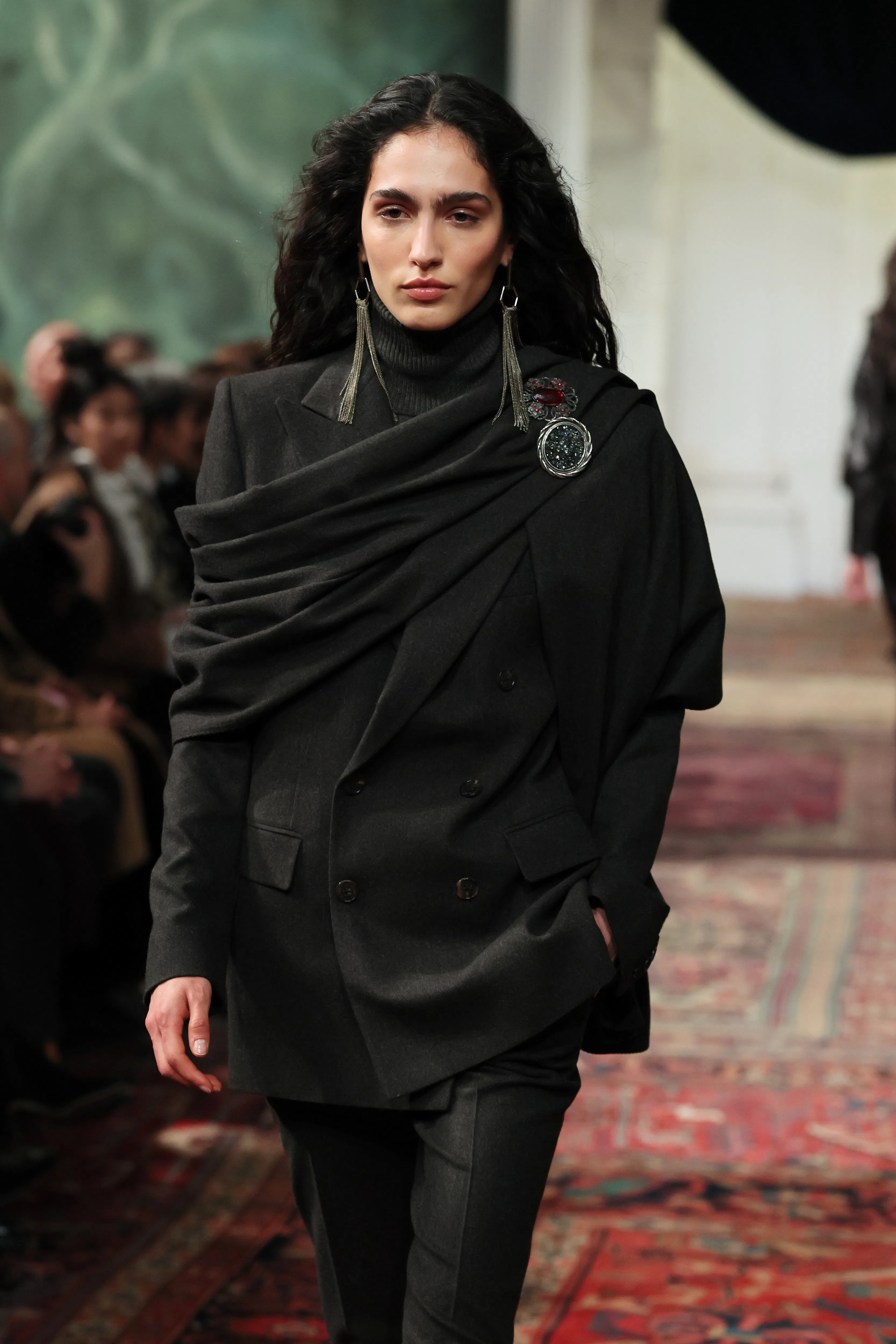 A model walks the runway for the Ralph Lauren fashion show 