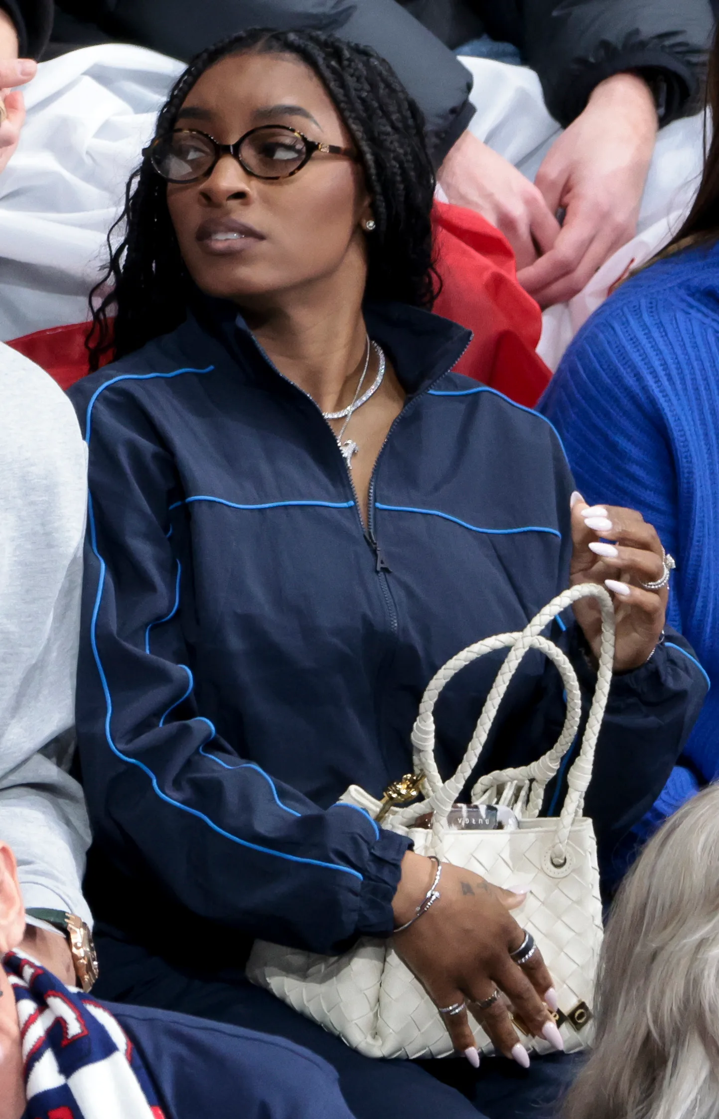 Simone Biles with a winter white manicure in Milan