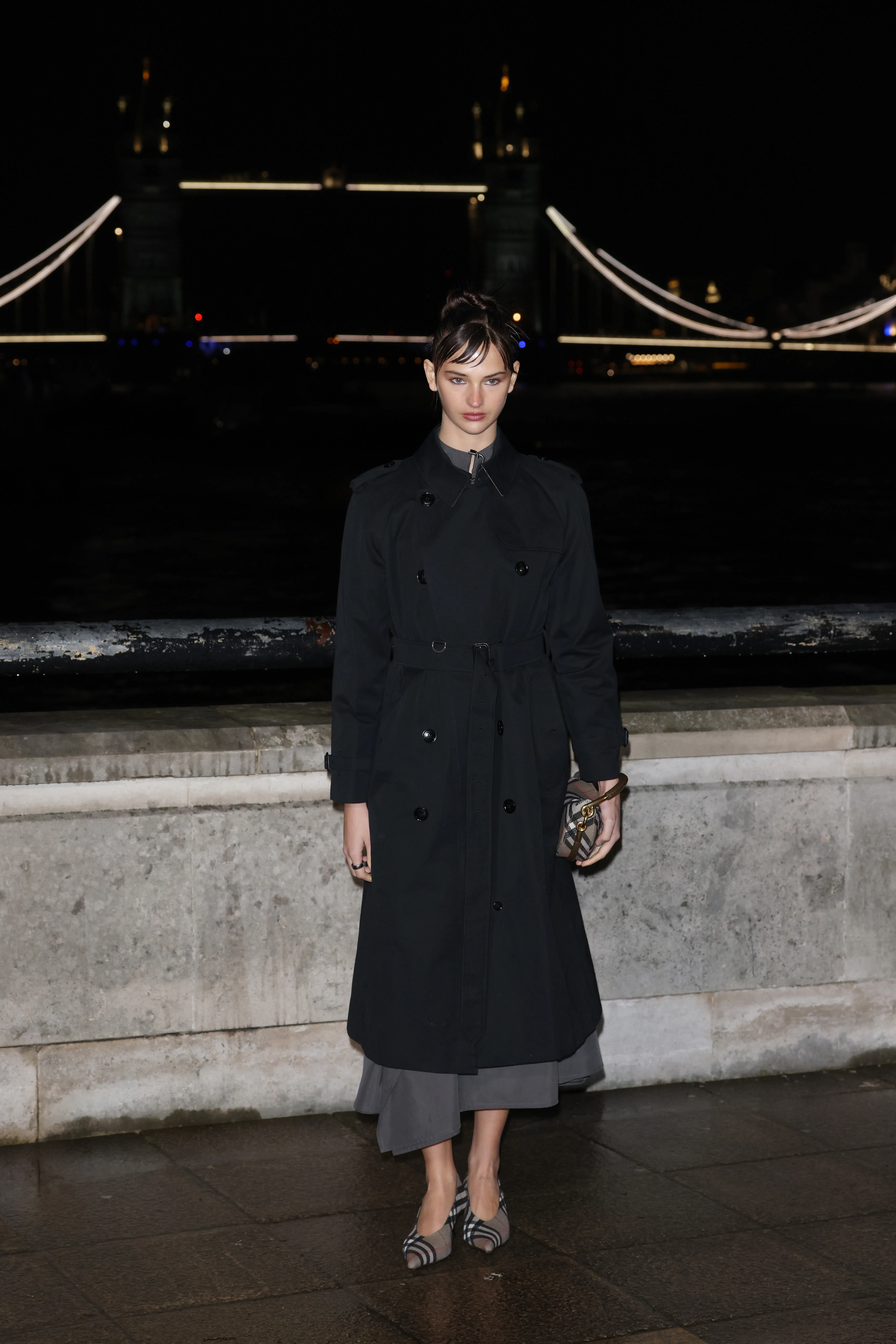 LONDON, ENGLAND - FEBRUARY 23: Mia Regan attends the Burberry show during London Fashion Week Februa...