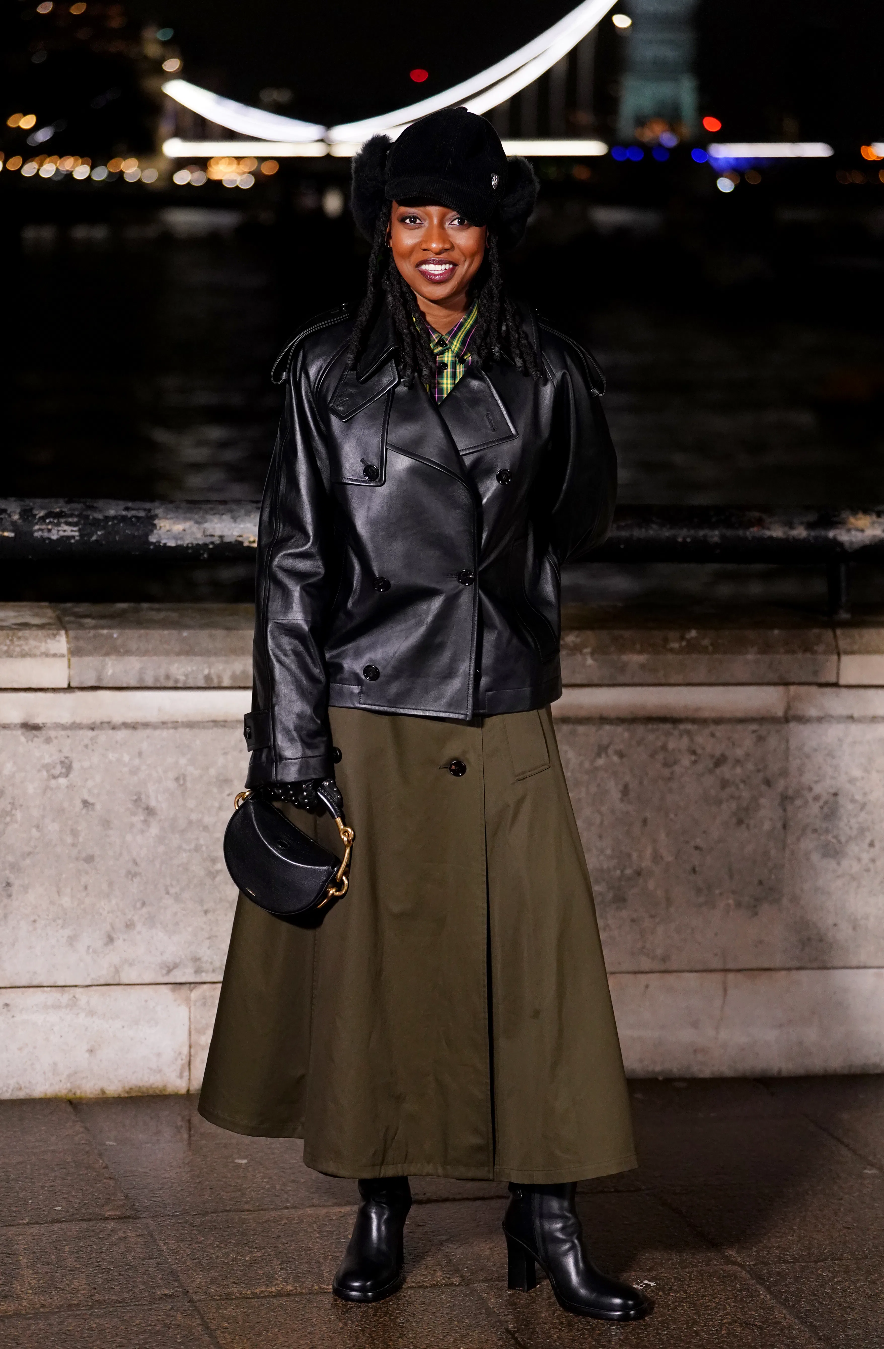 Little Simz attends the Burberry show at 1 Old Billingsgate Walk, London, during London Fashion Week...