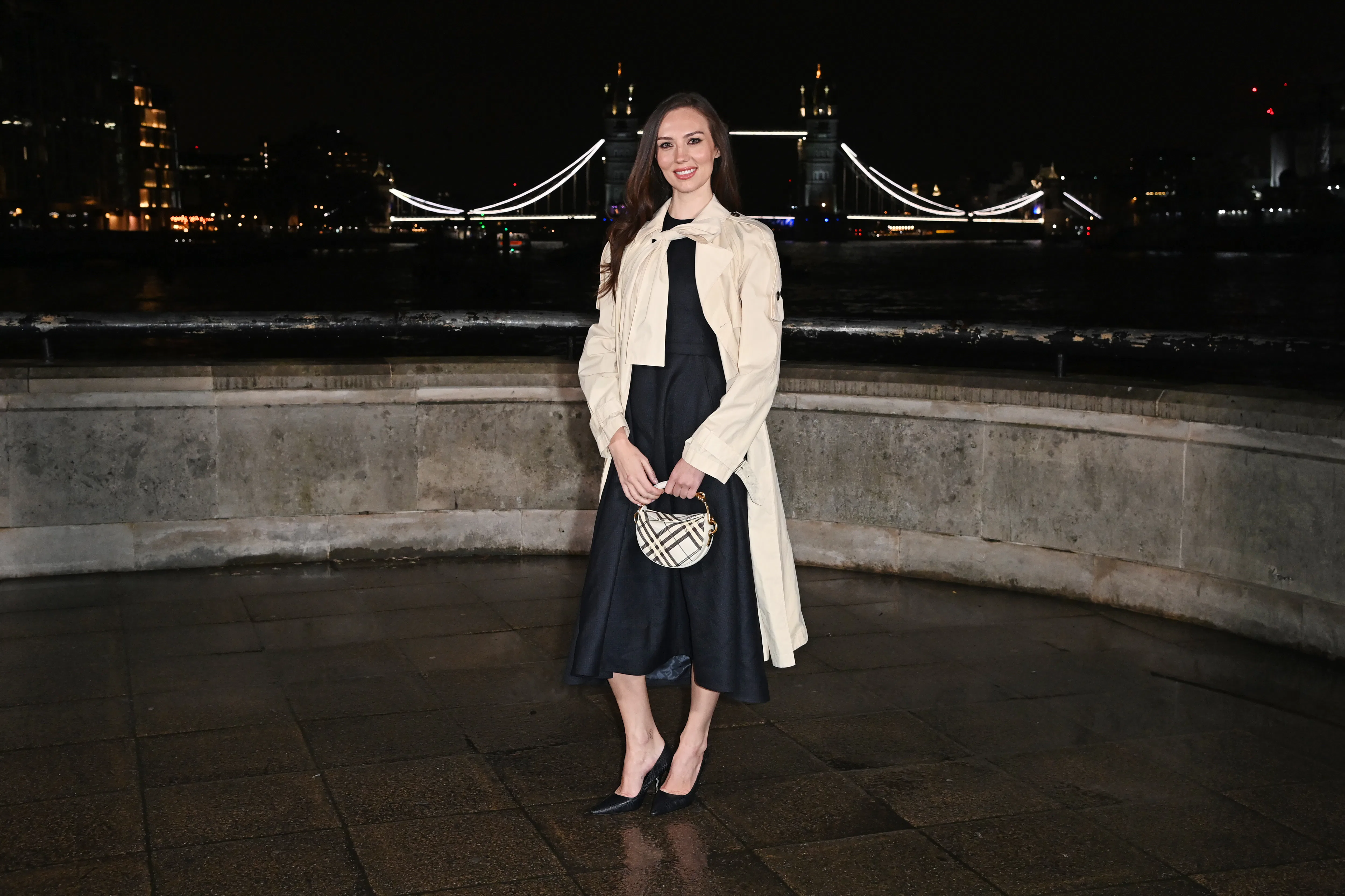 LONDON, ENGLAND - FEBRUARY 23: Sydney Carlson attends the Burberry Winter 2026 Show during London Fa...