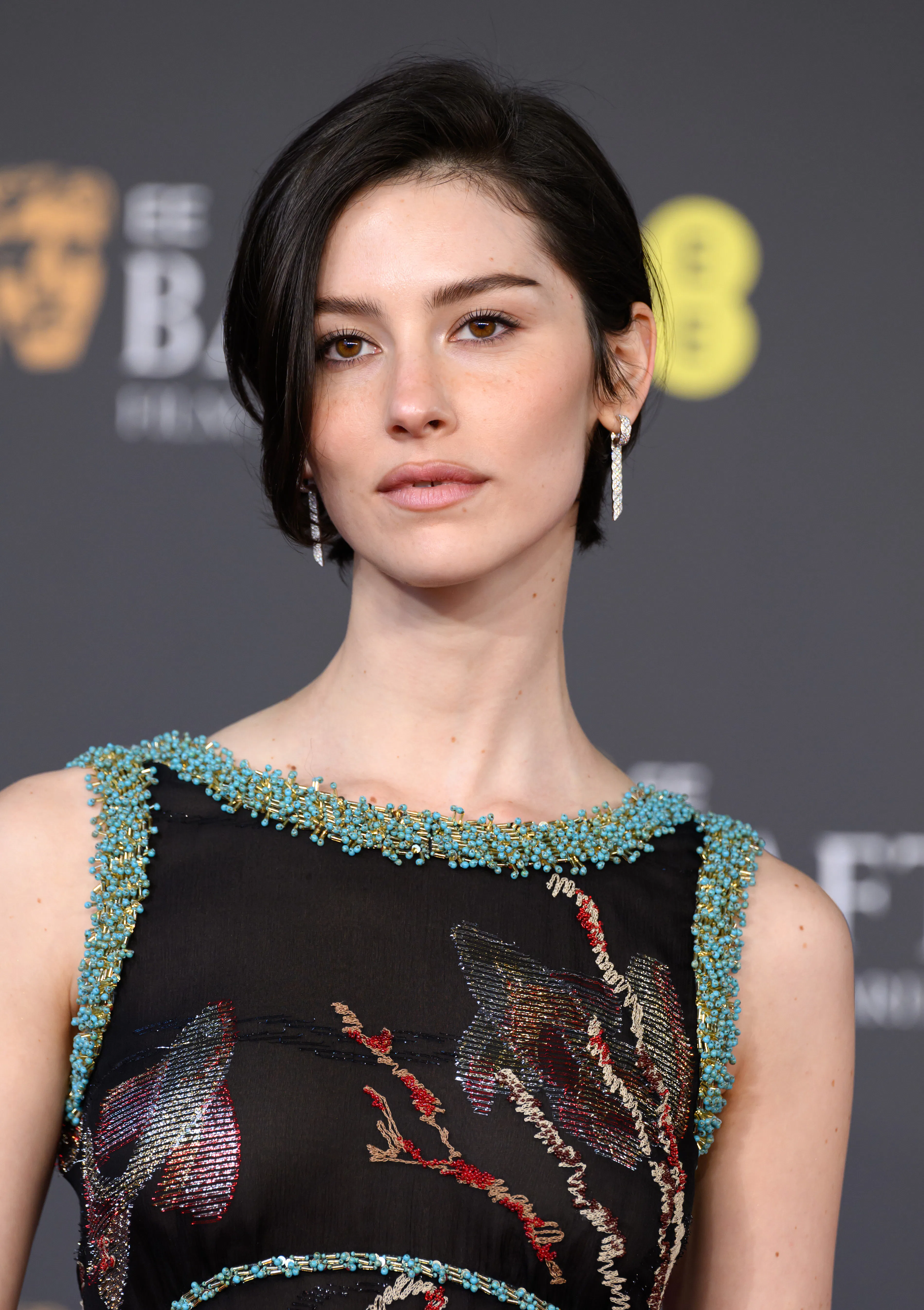 Gracie Abrams with a bixie on the BAFTA red carpet