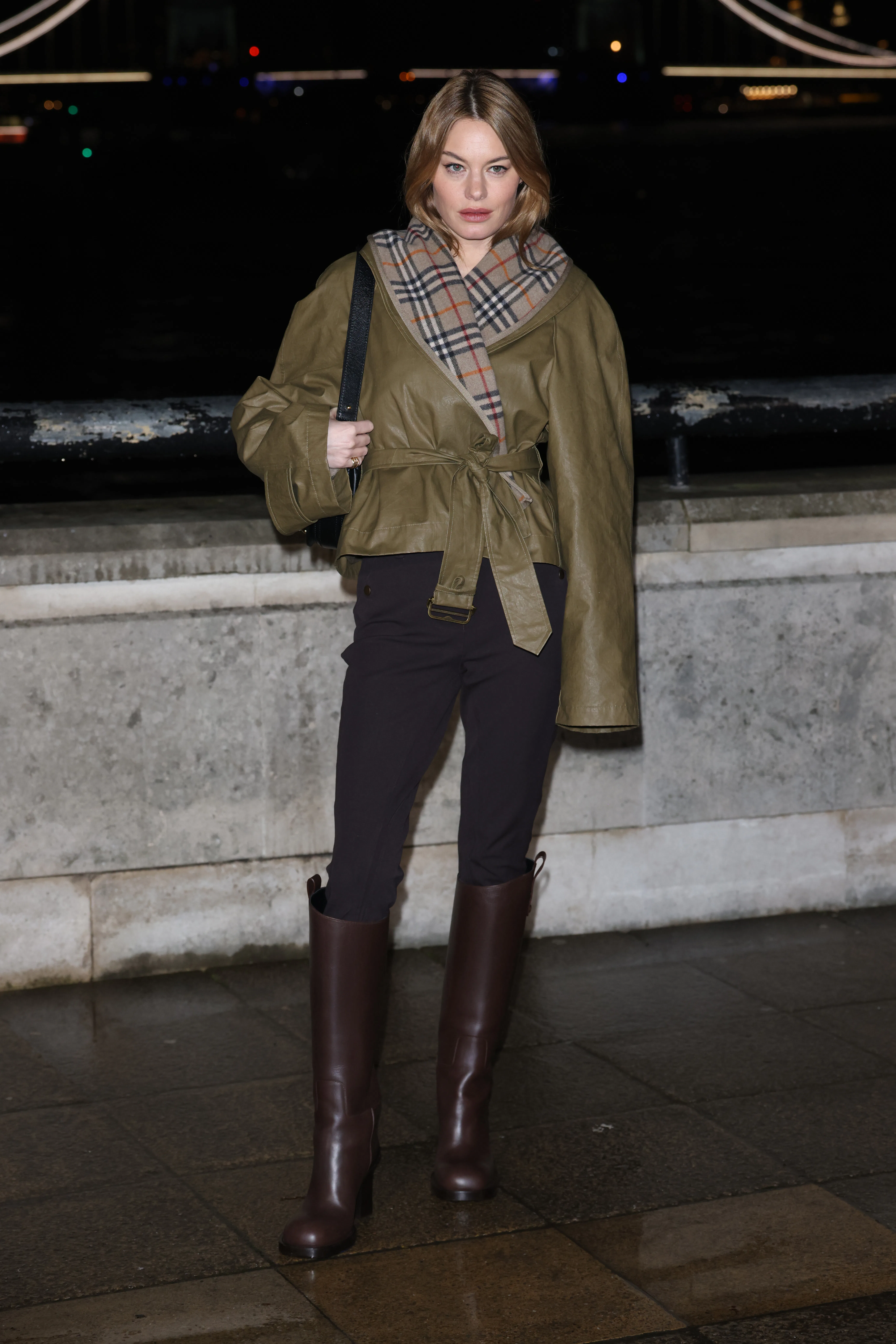 LONDON, ENGLAND - FEBRUARY 23: Camille Rowe attends the Burberry show during London Fashion Week Feb...