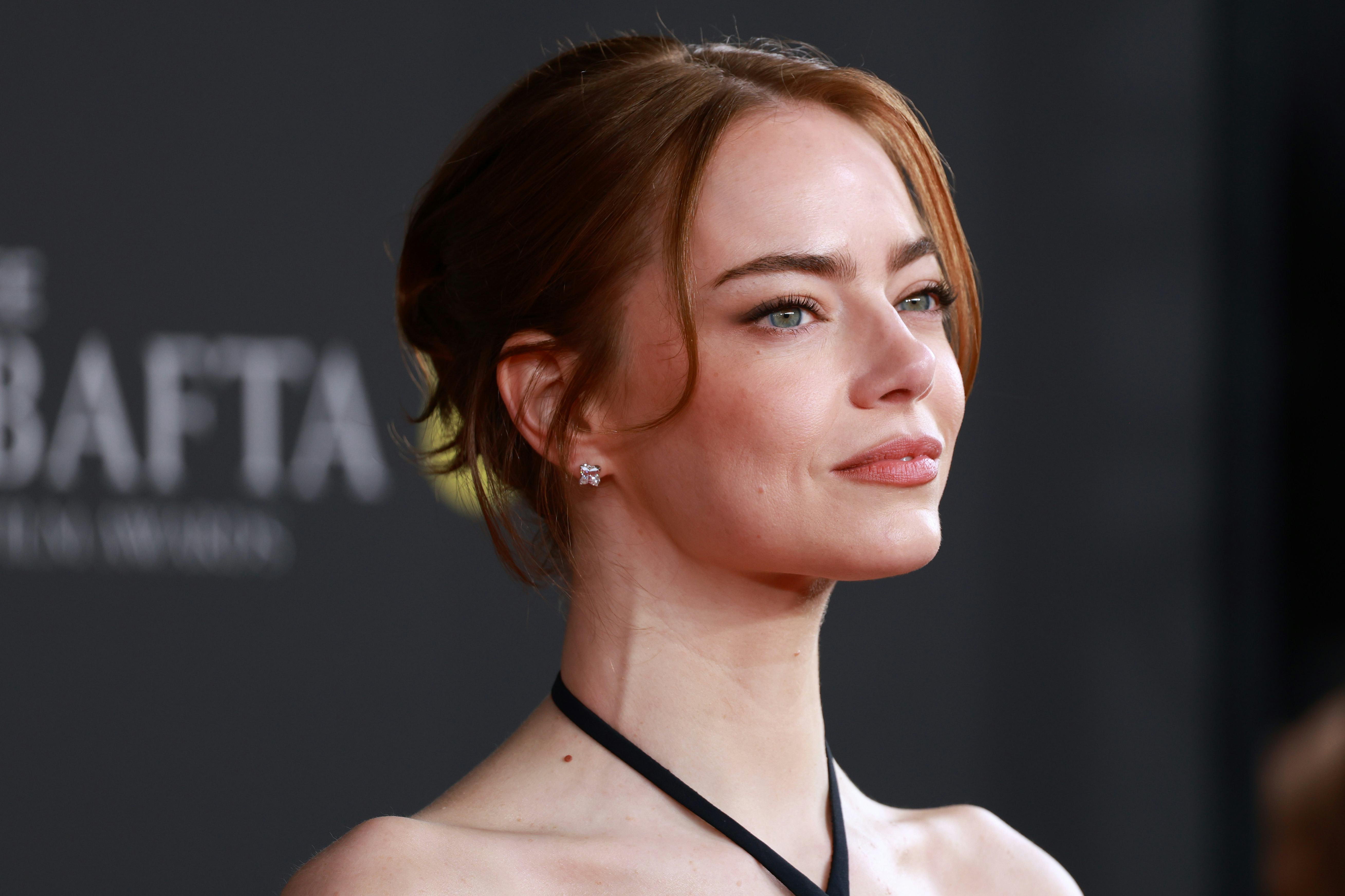 LONDON, ENGLAND - FEBRUARY 22: Emma Stone attends the 2026 EE BAFTA Film Awards at The Royal Festiva...