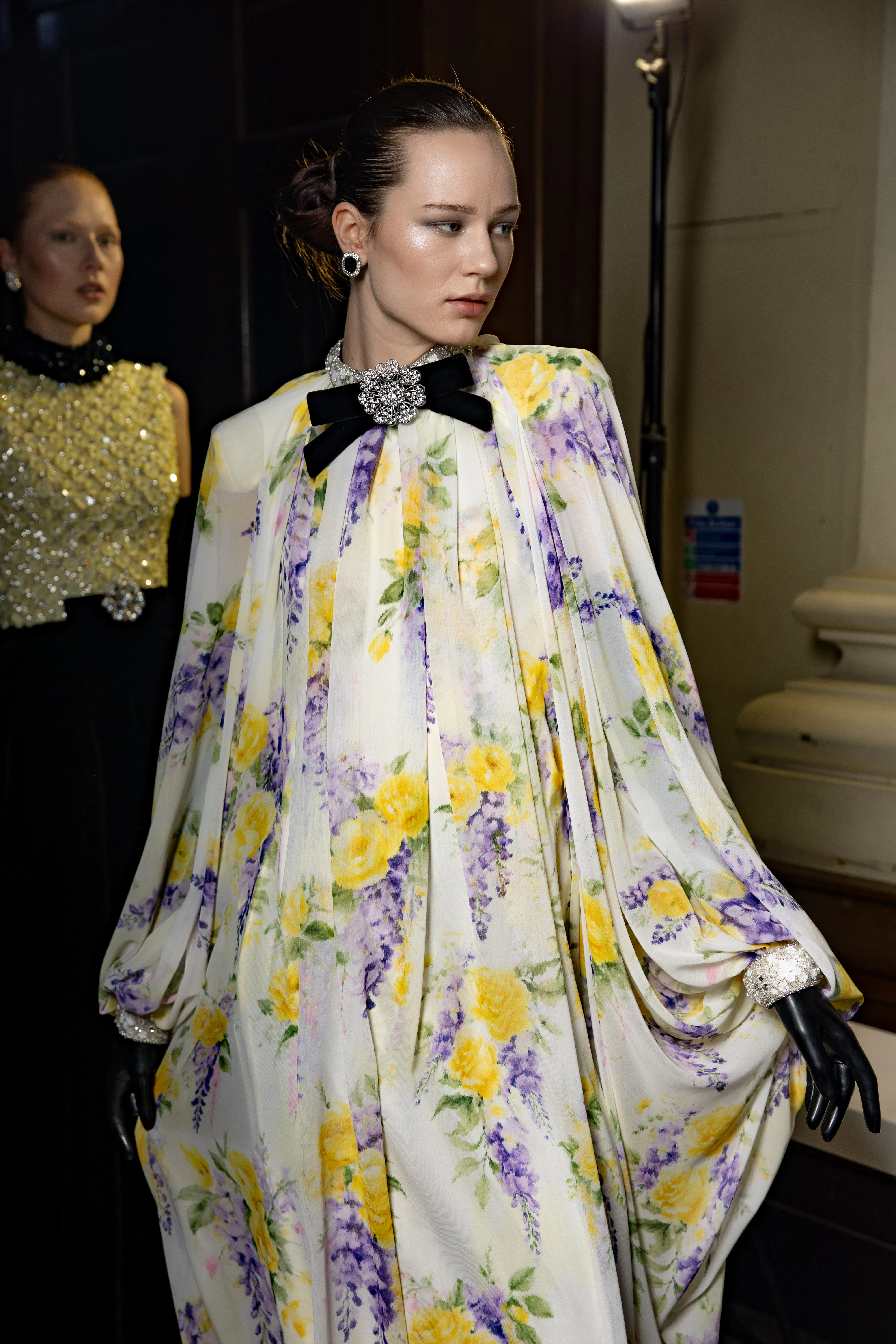 A model backstage ahead of the Richard Quinn show 