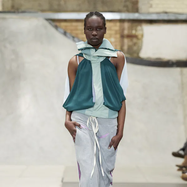 A model walks the runway at the Fashion East Ready to Wear Fall/Winter 2026-2027 fashion show