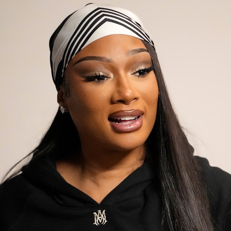 SACRAMENTO, CALIFORNIA - DECEMBER 27: Megan Thee Stallion, American rapper and songwriter looks on a...