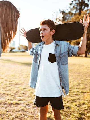 mother bothering the son with the skateboard