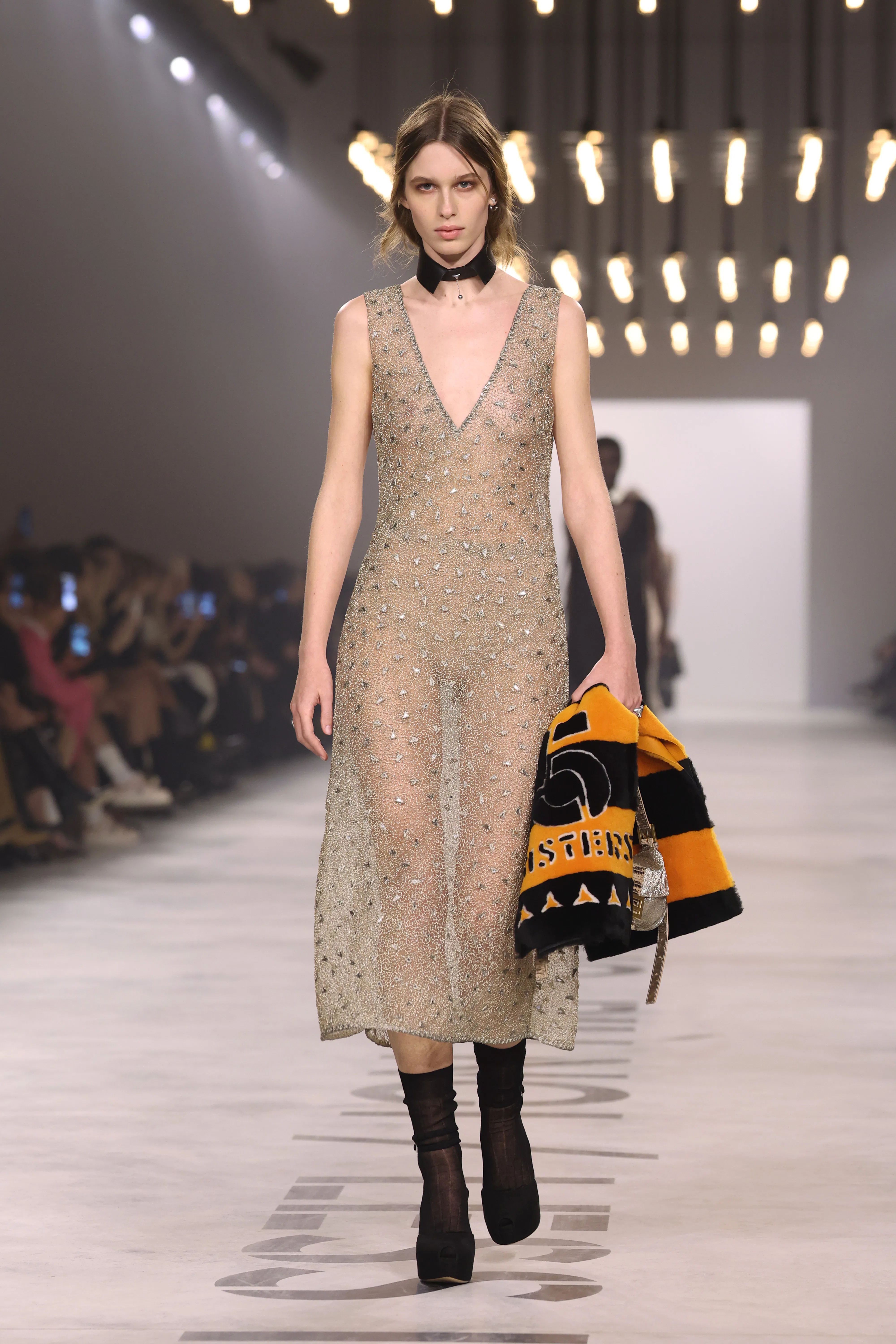 A model walks the runway at the Fendi fashion show during the Milan Fashion Week 