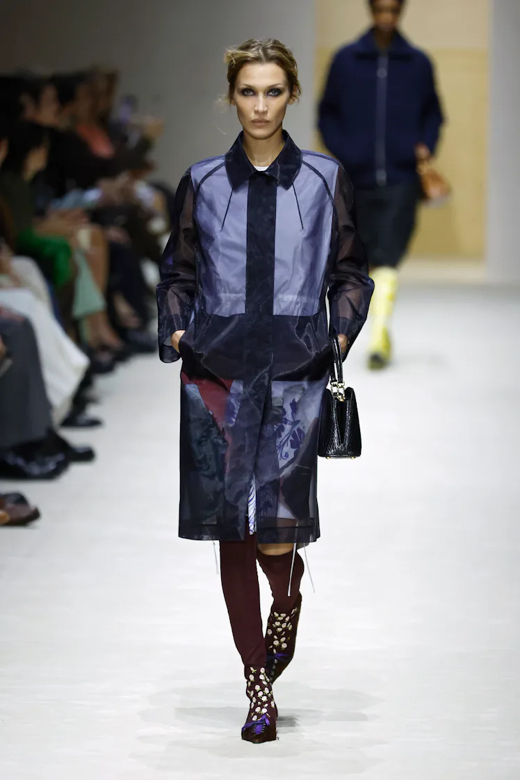 MILAN, ITALY - FEBRUARY 26: A model walks the runway at the Prada fashion show during the Milan Fash...