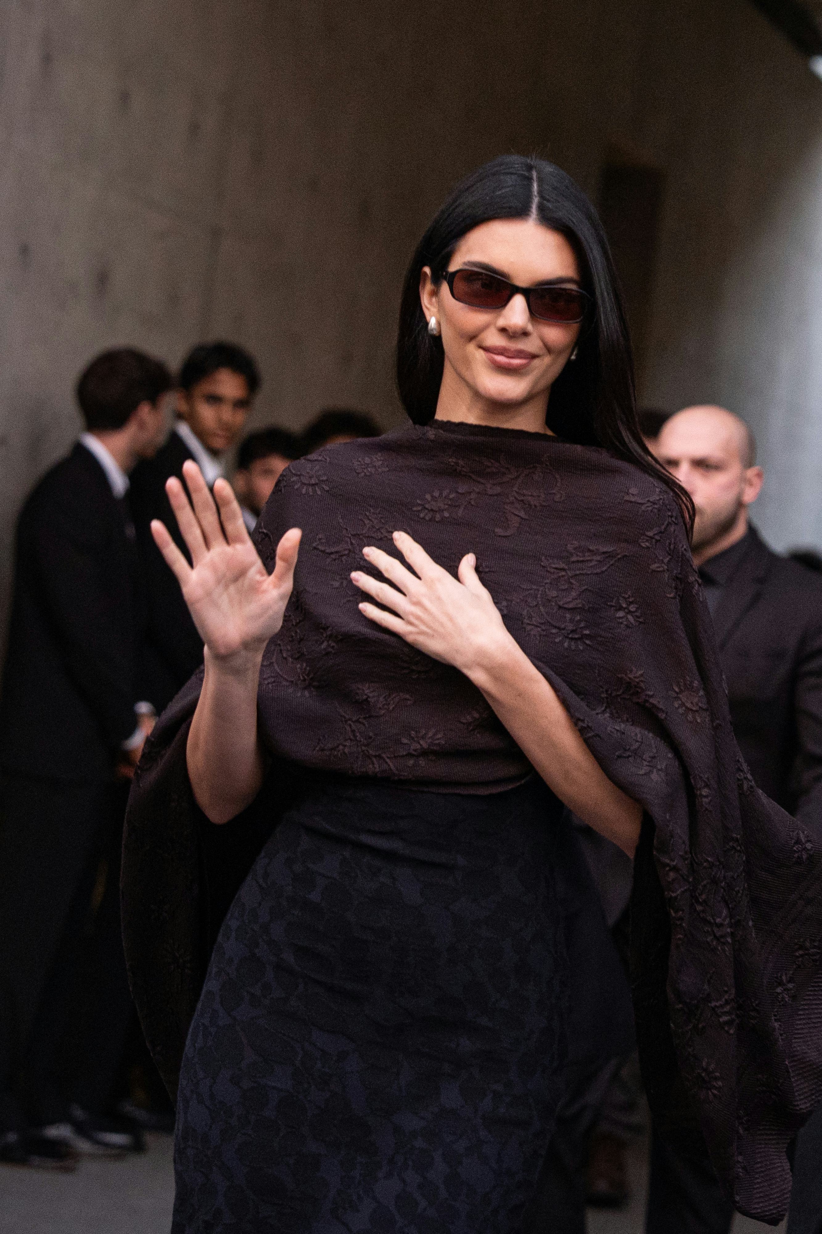 Kendall Jenner is seen at Emporio Armani show during the Milan Fashion Week - Womenswear Fall/Winter...