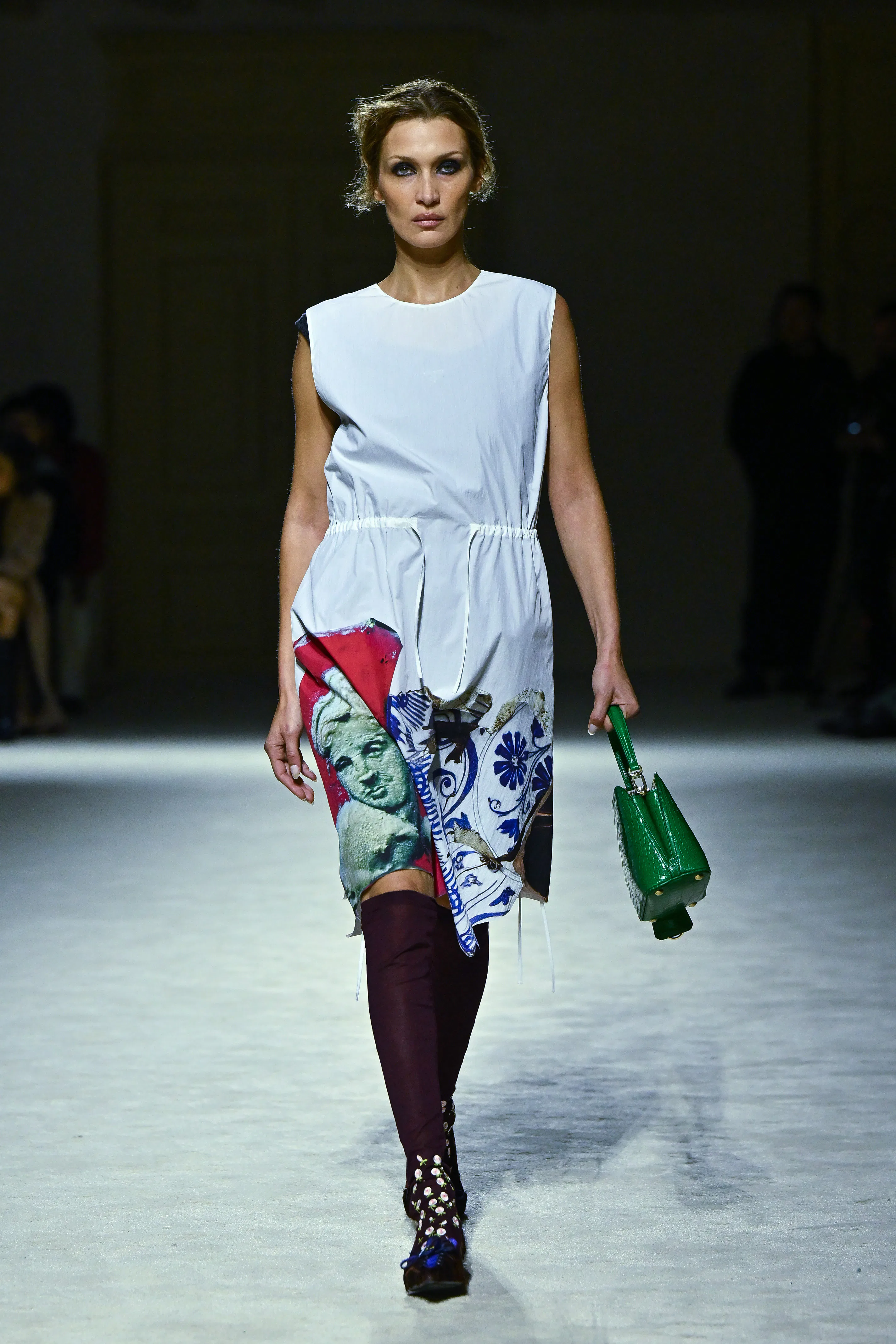 MILAN, ITALY - FEBRUARY 26: Bella Hadid walks the runway at the Prada fashion show during the Milan ...