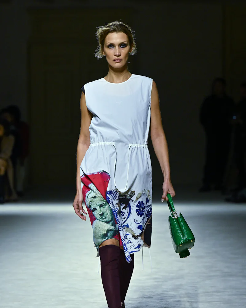 MILAN, ITALY - FEBRUARY 26: Bella Hadid walks the runway at the Prada fashion show during the Milan ...