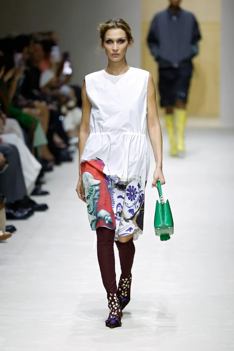 MILAN, ITALY - FEBRUARY 26: A model walks the runway at the Prada fashion show during the Milan Fash...