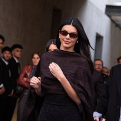 MILAN, ITALY - FEBRUARY 26: Kendall Jenner is seen at Emporio Armani show during the Milan Fashion W...