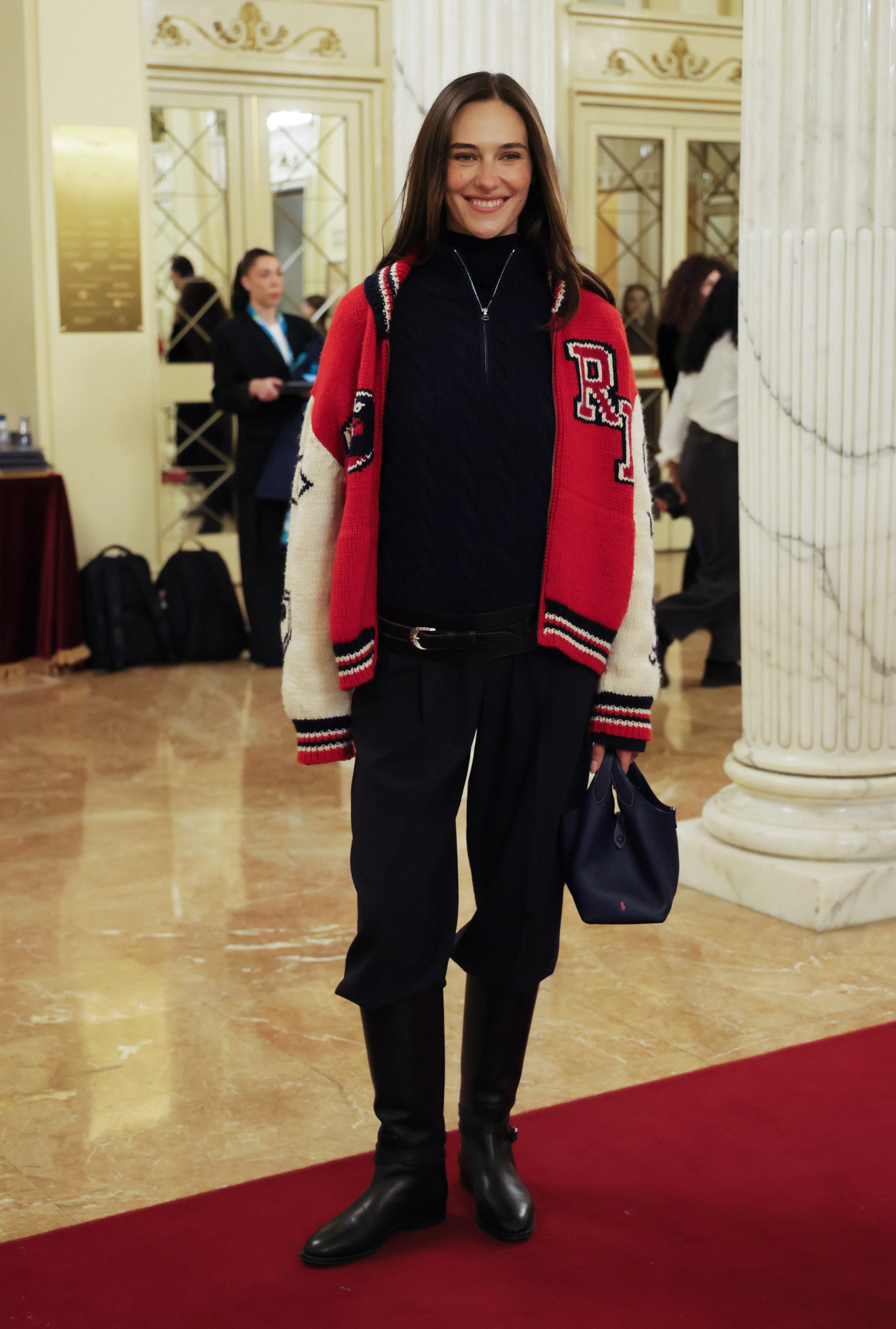 The Celebrity Attends the 2026 Winter Olympics Opening Ceremony Devon Lee Carlson