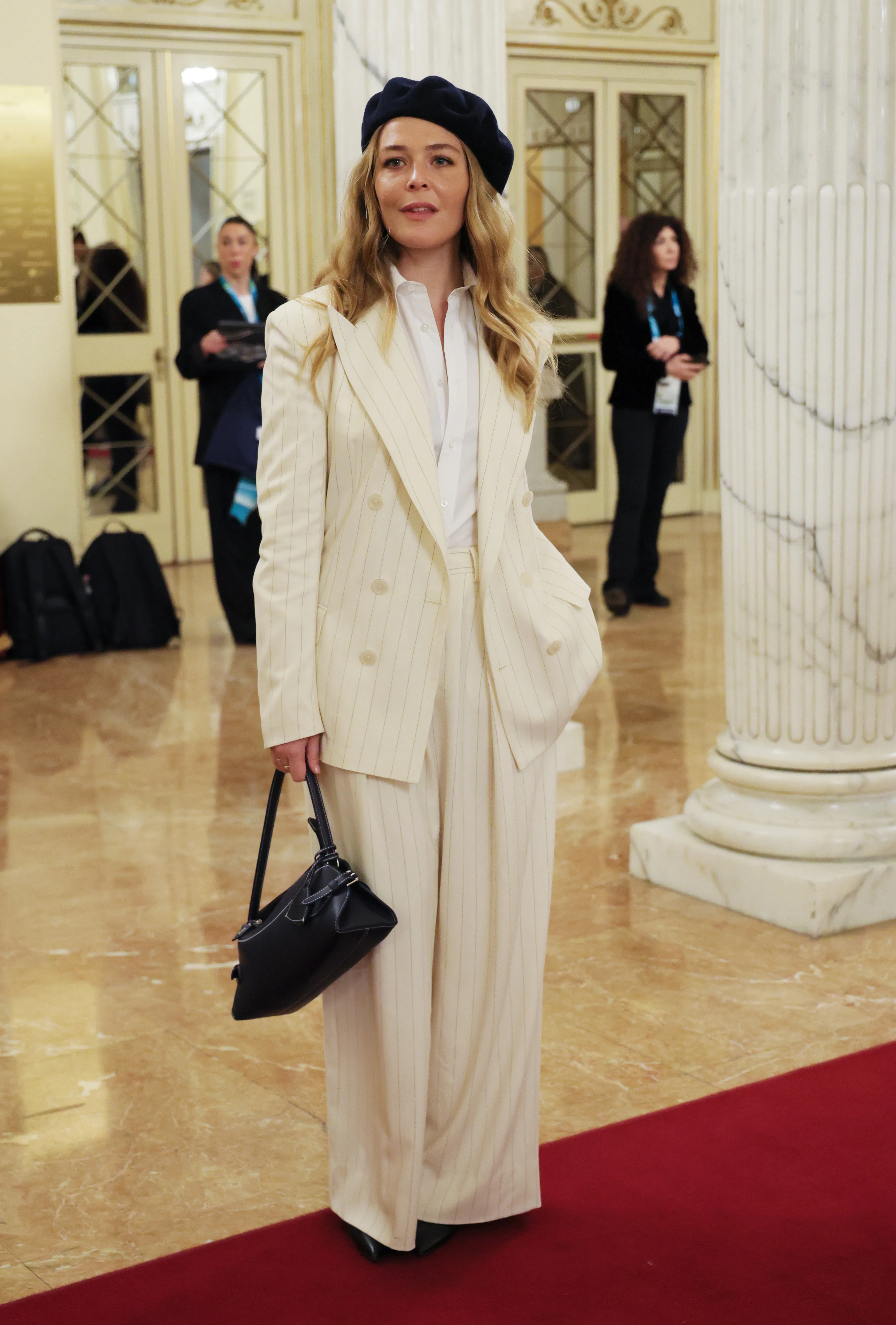 The Celebrity Attends the 2026 Winter Olympics Opening Ceremony Maggie Rogers