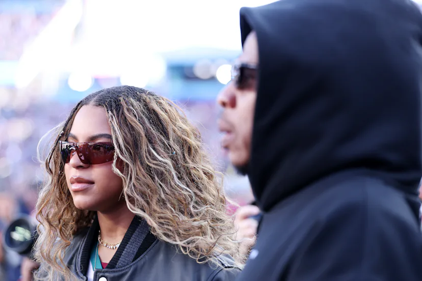 SANTA CLARA, CALIFORNIA - FEBRUARY 08: Jay-Z and daughter Blue Ivy Carter look on prior to the start...