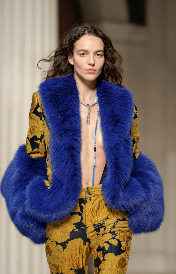 A model, fashion detail, walks the runway during the Nina Ricci Womenswear Fall/Winter 2026-