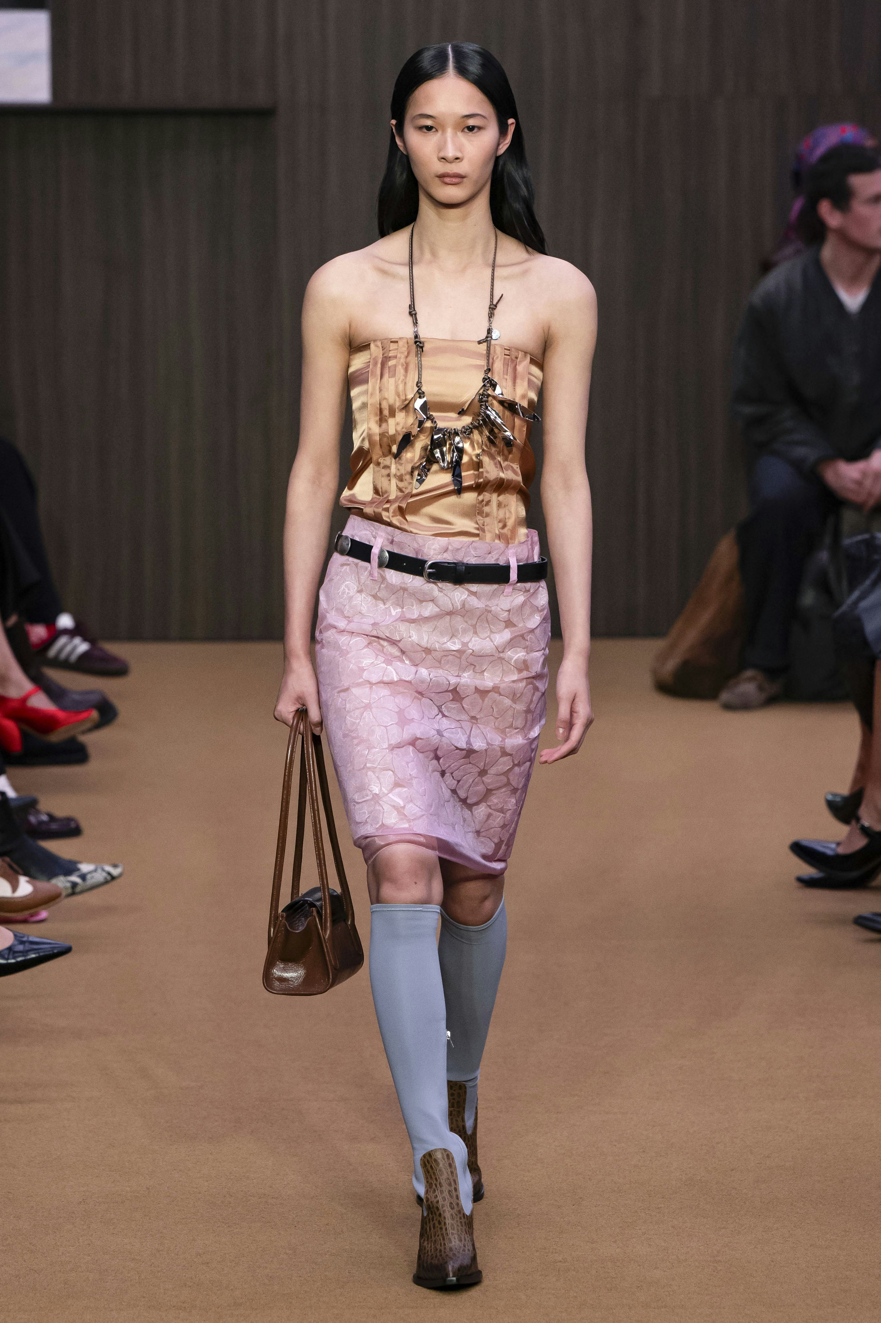 MILAN, ITALY - FEBRUARY 26: A model walks the runway at the Marni Ready to Wear Fall/Winter 2026/202...