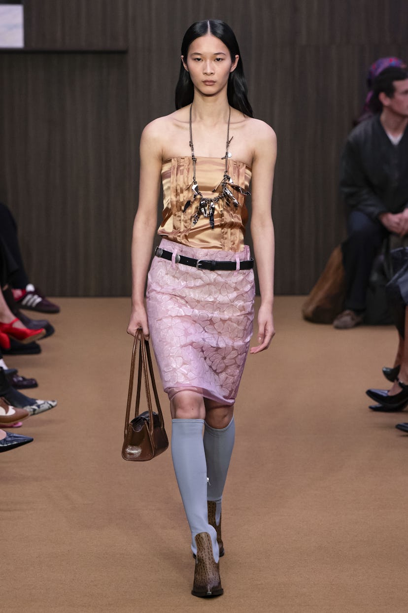 MILAN, ITALY - FEBRUARY 26: A model walks the runway at the Marni Ready to Wear Fall/Winter 2026/202...