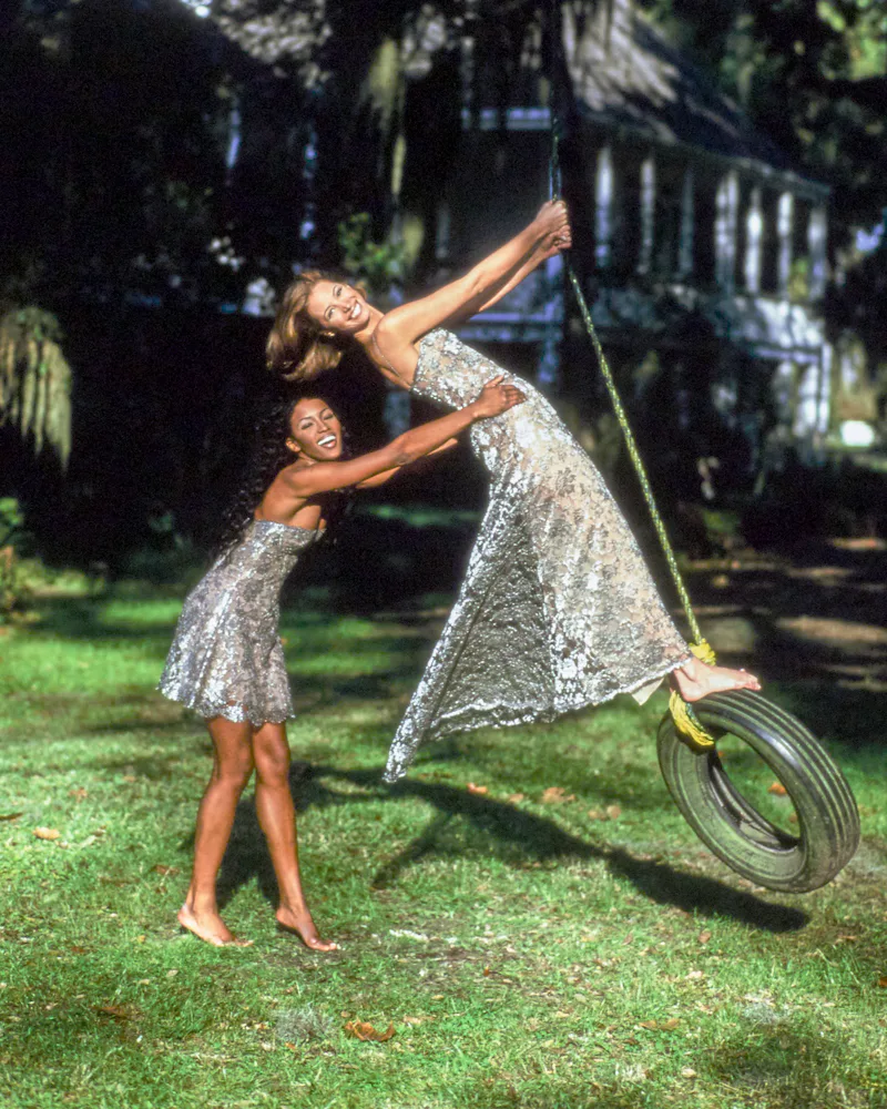 Christy Turlington and Naomi Campbell modeling for Calvin Klein