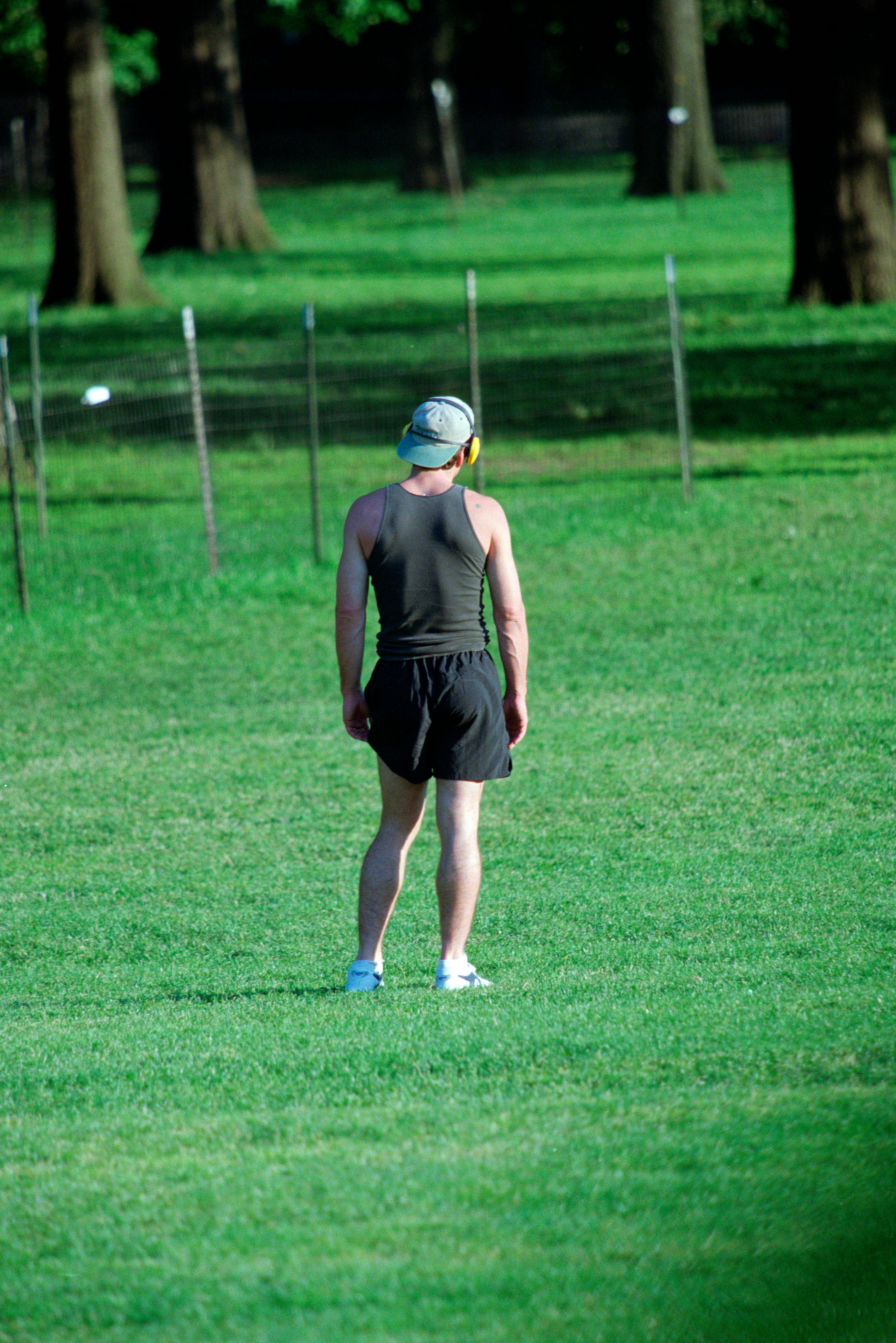 John Kennedy Jr. stretching and exercising in short in Central Park, June 4, 1998. (Photo by Lawrenc...