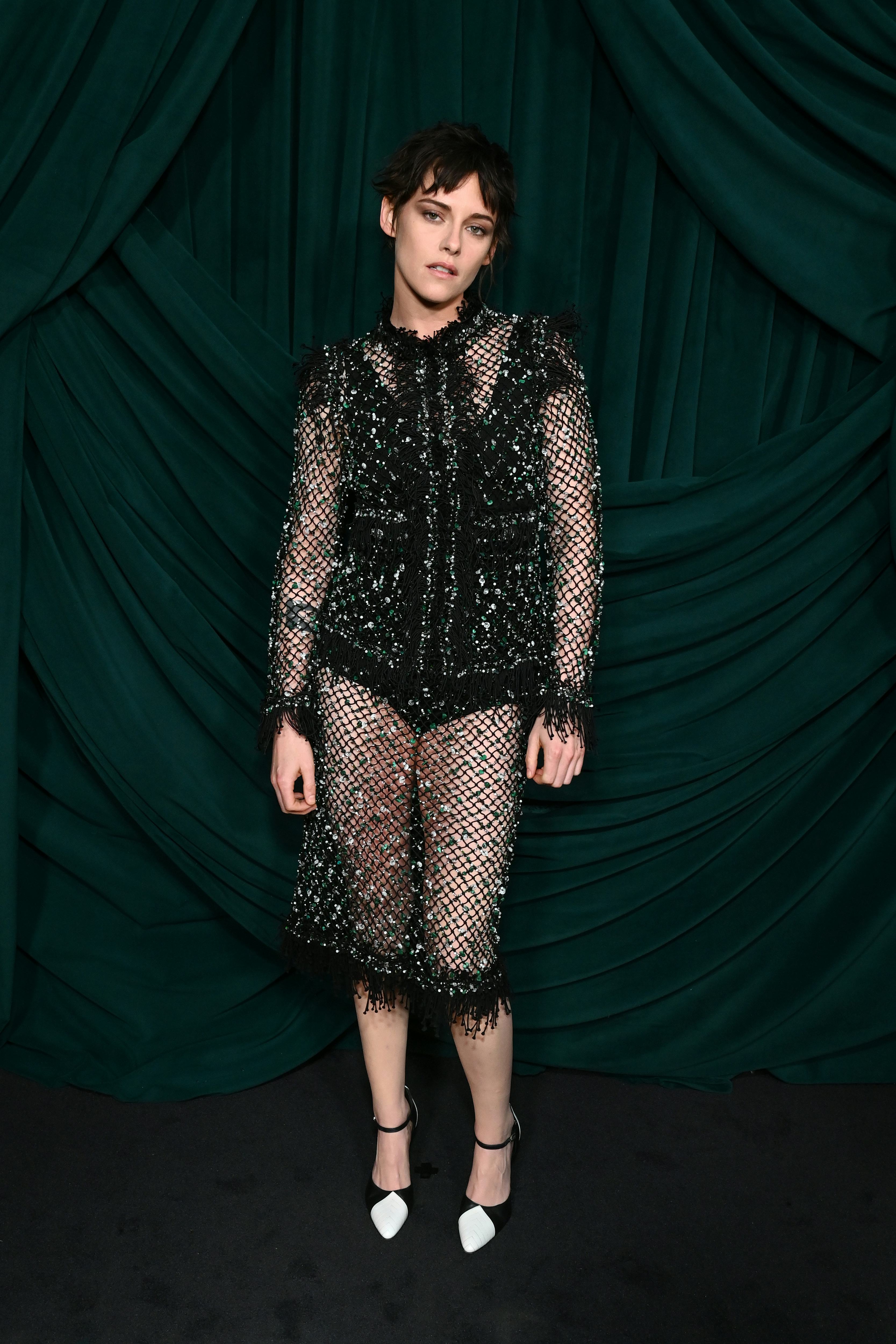 Kristen Stewart, wearing CHANEL, attends the CHANEL and Charles Finch Annual Pre-Oscar Dinner 
