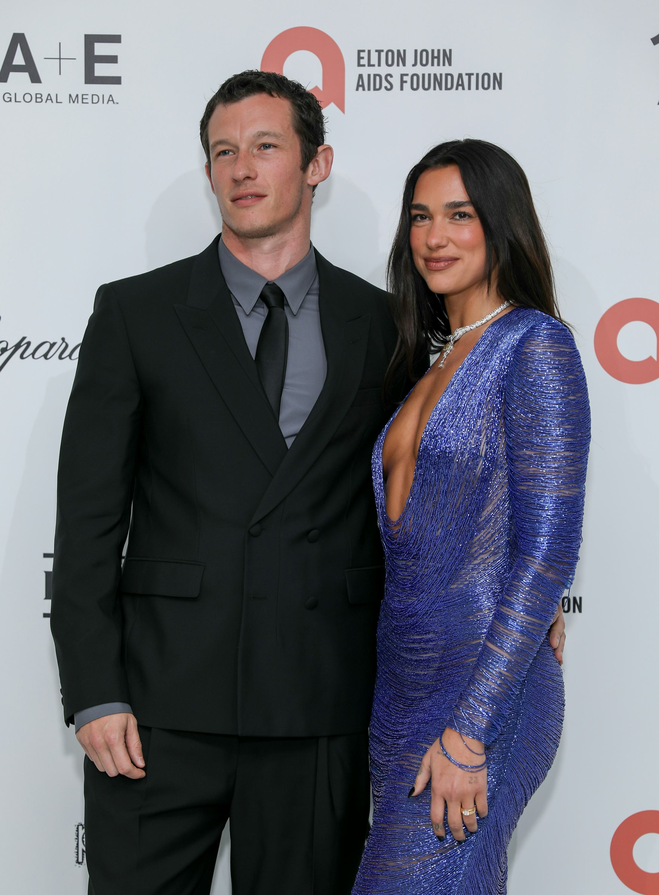 Dua Lipa and Callum Turner at the 34th Annual Elton John AIDS Foundation Academy Awards Viewing Part...