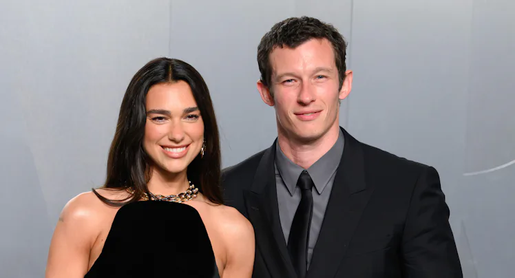 LOS ANGELES, CALIFORNIA - MARCH 15: (L-R) Dua Lipa and Callum Turner attend the 2026 Vanity Fair Osc...