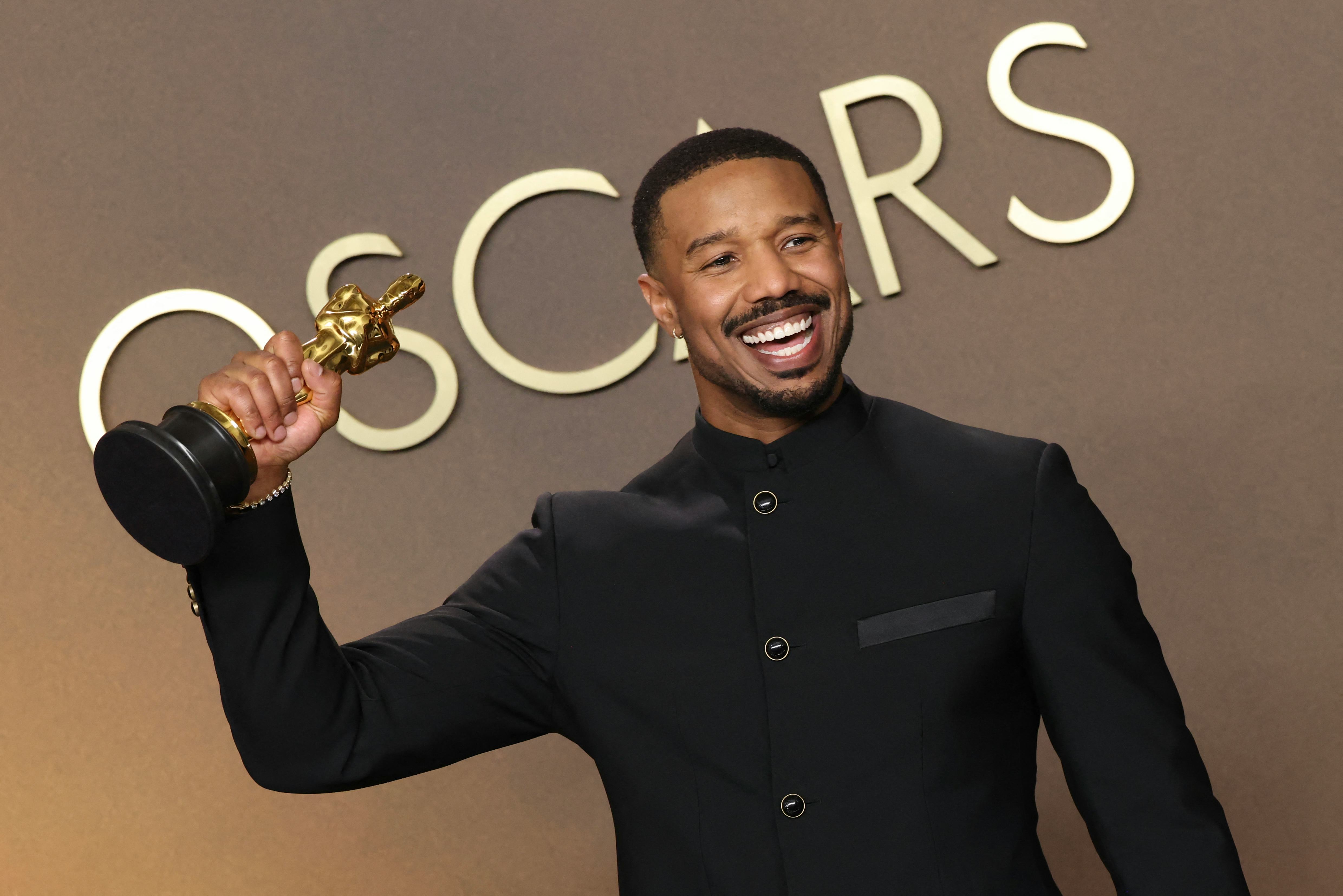 US actor Michael B. Jordan poses in the press room with the Oscar for Best Actor in a Leading Role f...