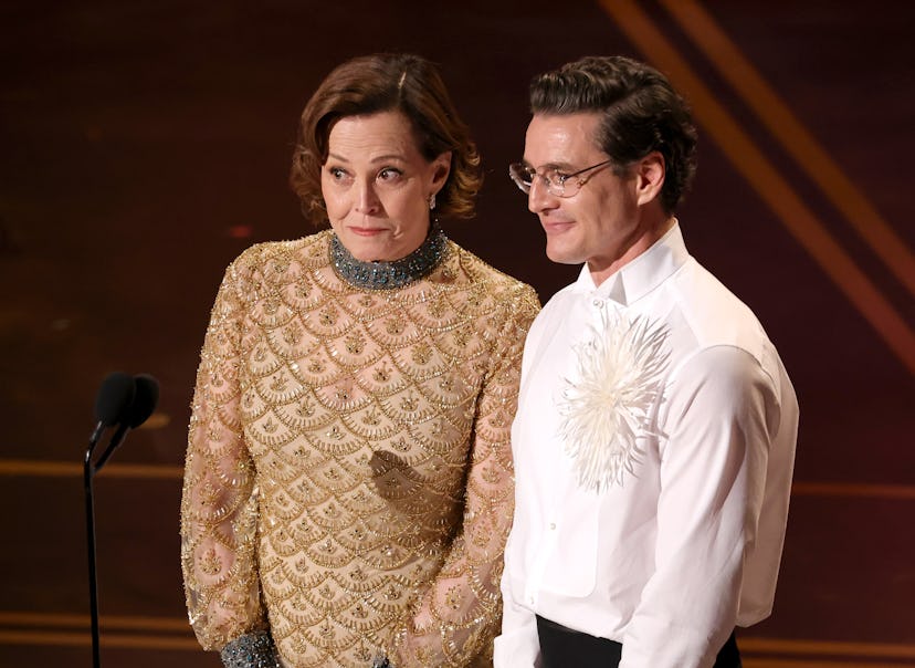 HOLLYWOOD, CALIFORNIA - MARCH 15: (L-R) Sigourney Weaver and Pedro Pascal speak onstage during the 9...
