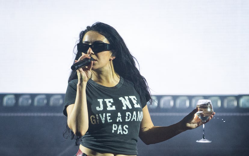 ROSKILDE, DENMARK - JULY 02: Charli XCX performs on the Orange stage at Roskilde Festival 2025 on Ju...