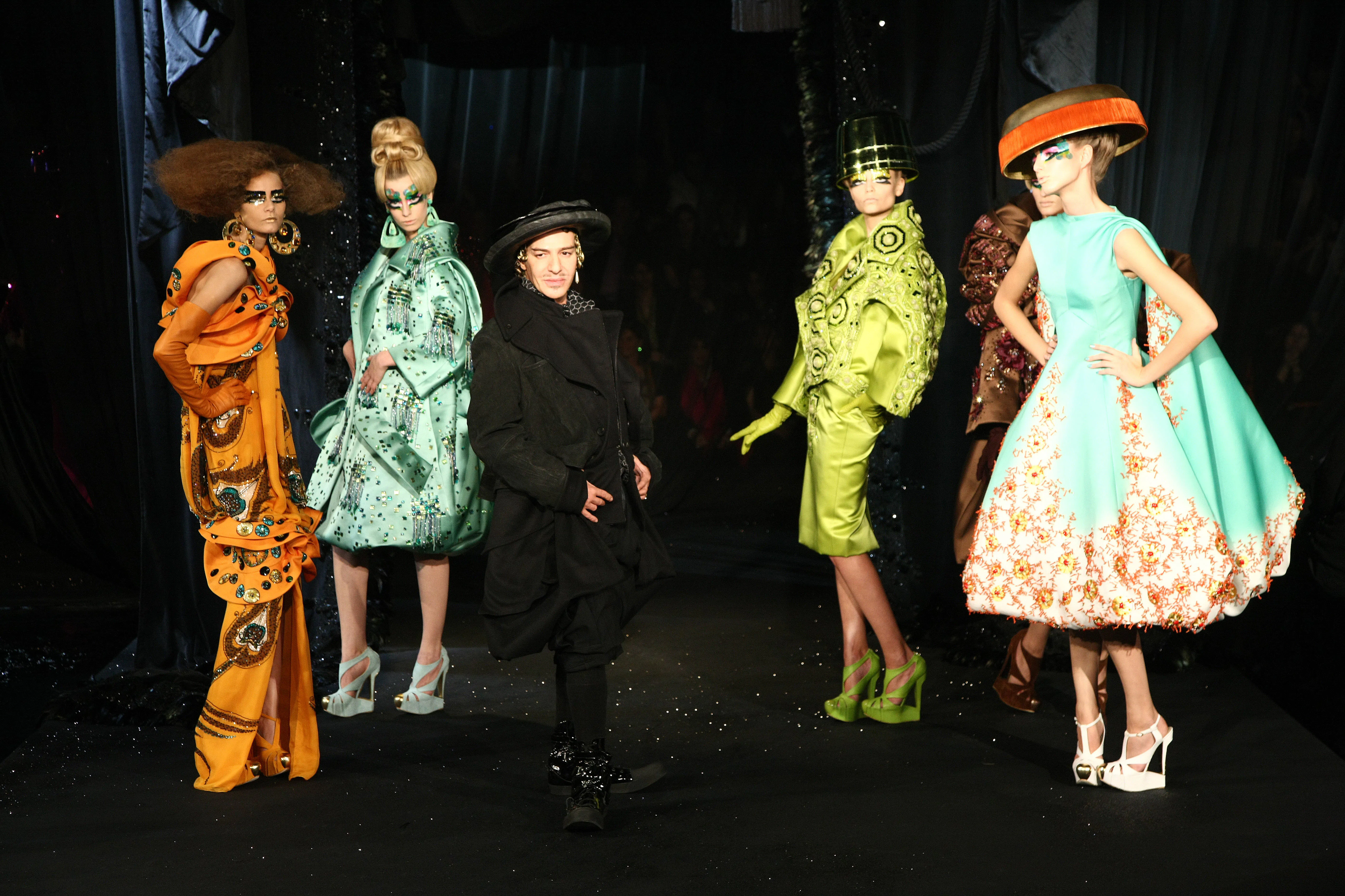 Designer John Galliano (C) with models on the runway at the Christian Dior Spring/Summer 2008