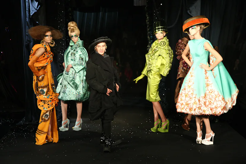 Designer John Galliano (C) with models on the runway at the Christian Dior Spring/Summer 2008