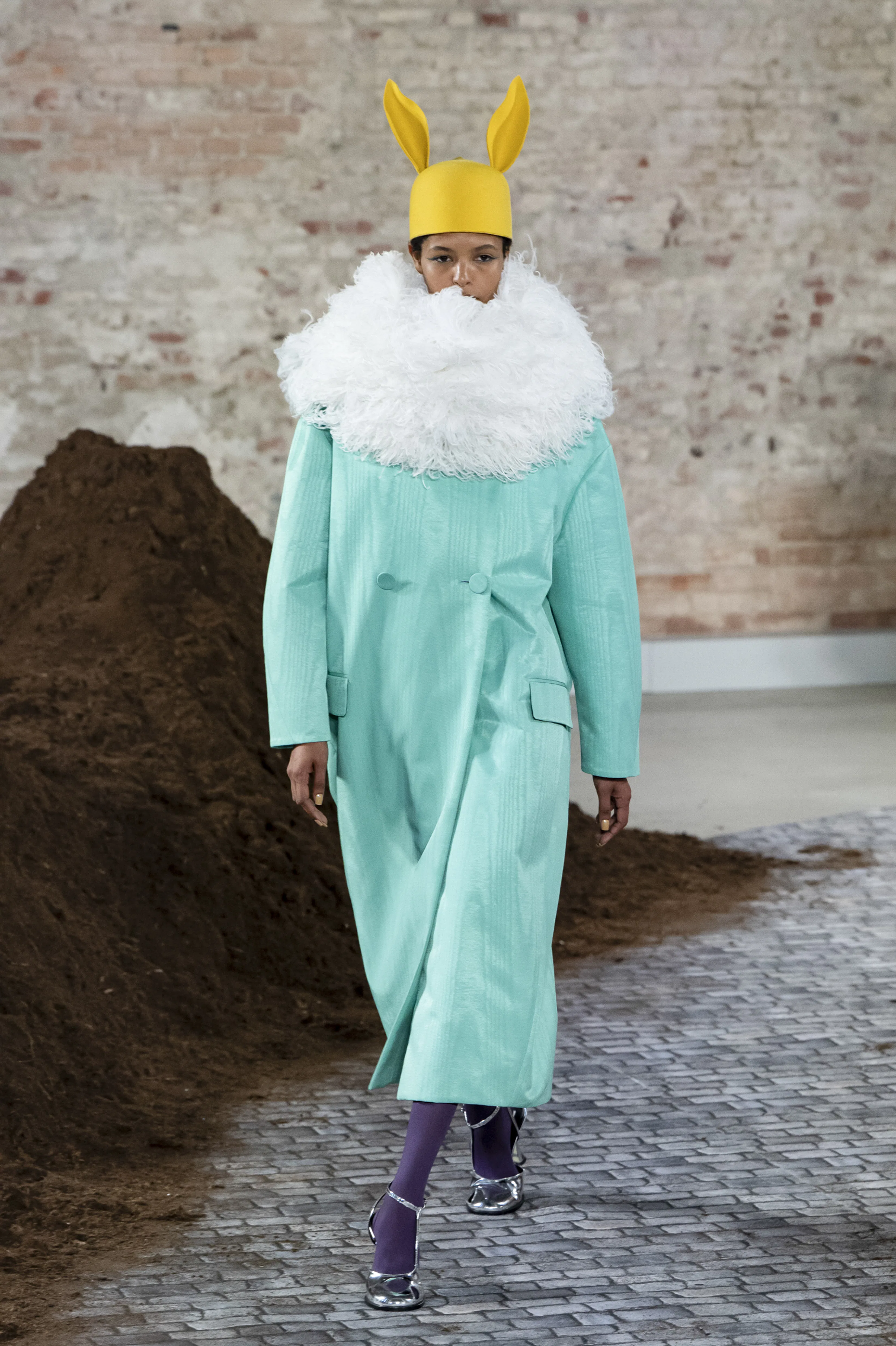 A model walks the runway at the Moschino Ready to Wear Fall/Winter 2026