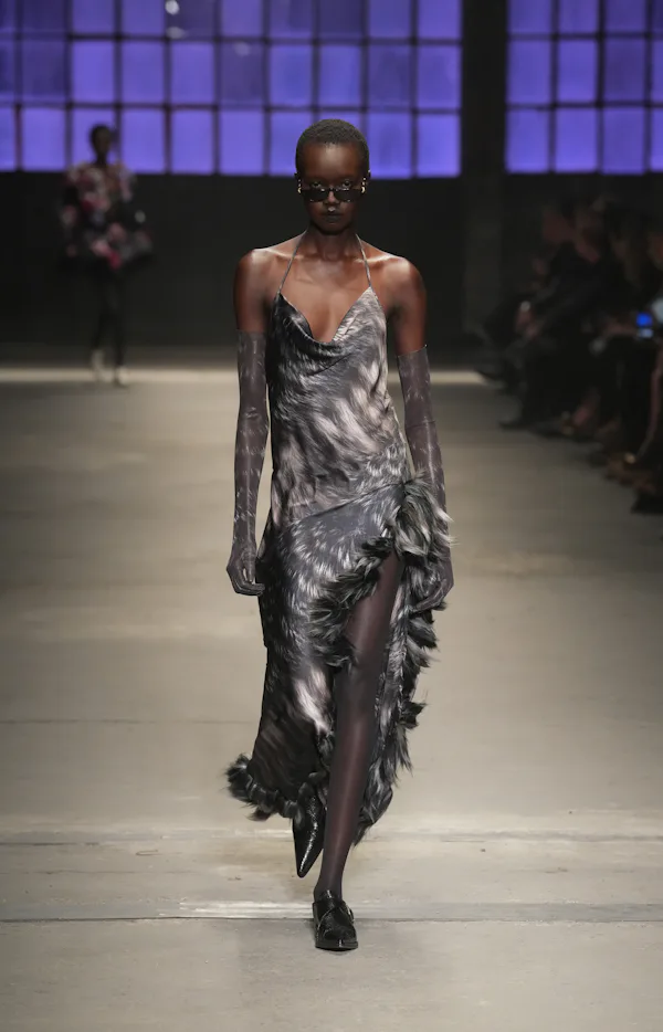 A model walks the runway at the Roberto Cavalli fashion show during the Milan Fashion Week