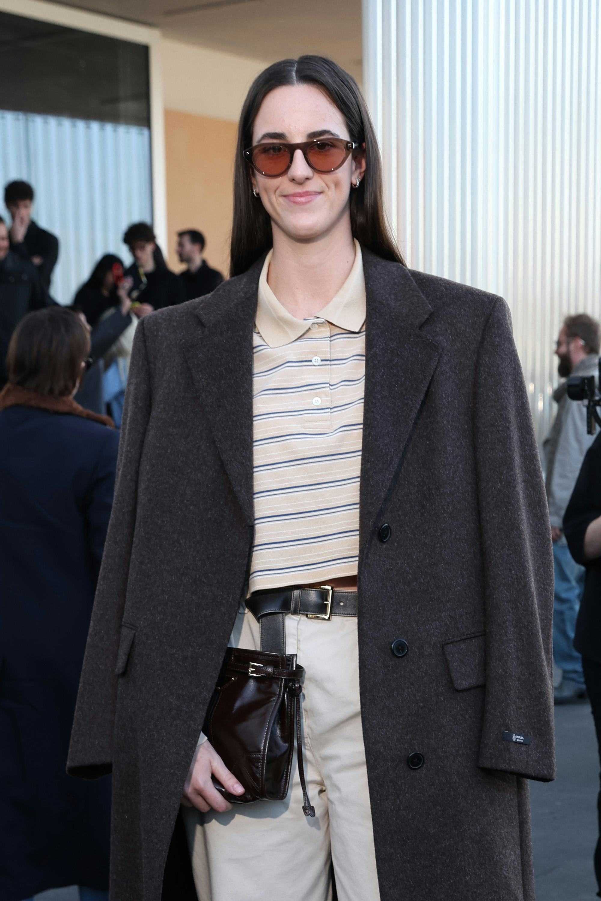 MILAN, ITALY - FEBRUARY 26: Caitlin Clark attends the Prada fashion show during the Milan Menswear F...