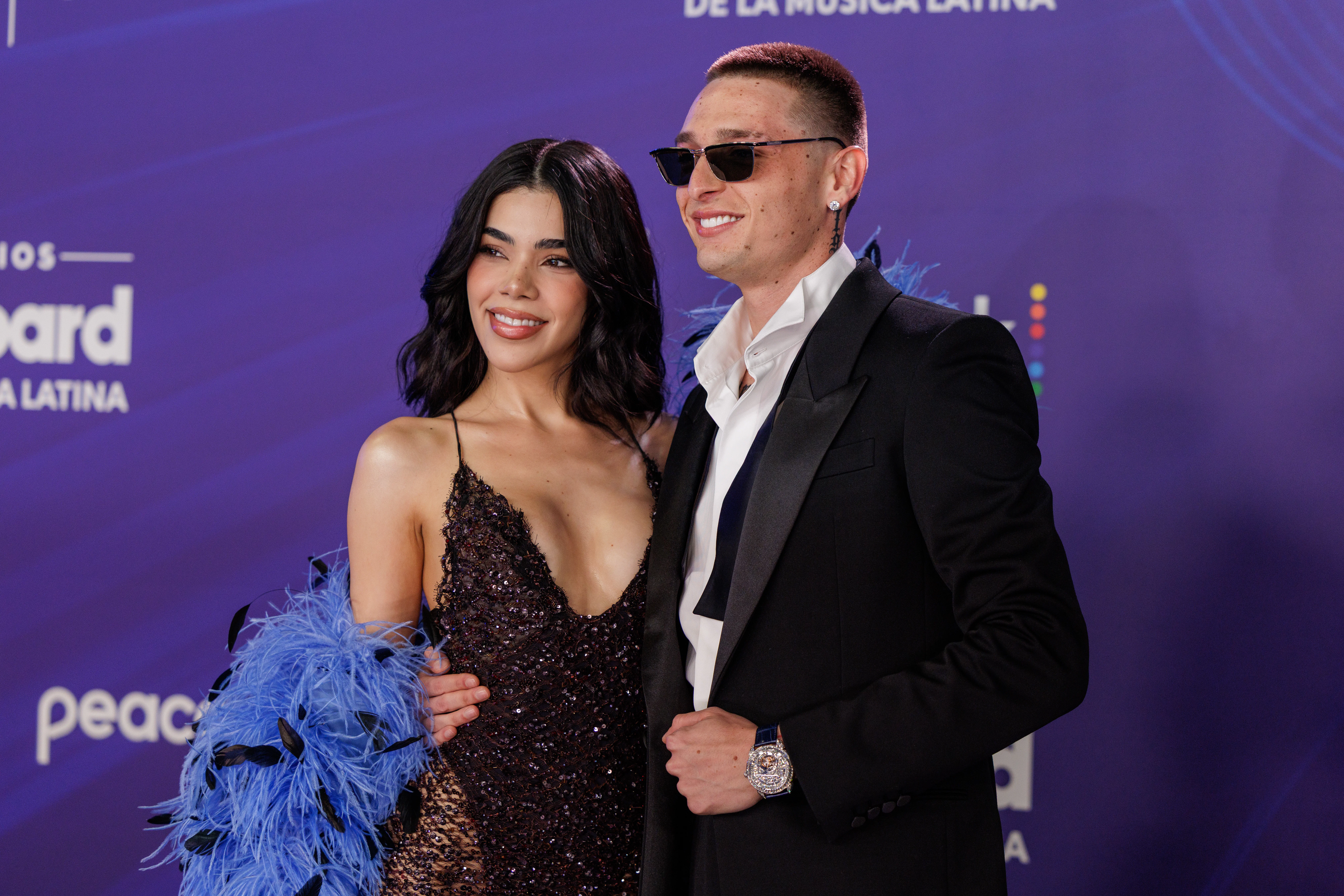 Kenia Os and Peso Pluma attend the 2025 Billboard Latin Music Awards on October 23 in Miami, Florida...