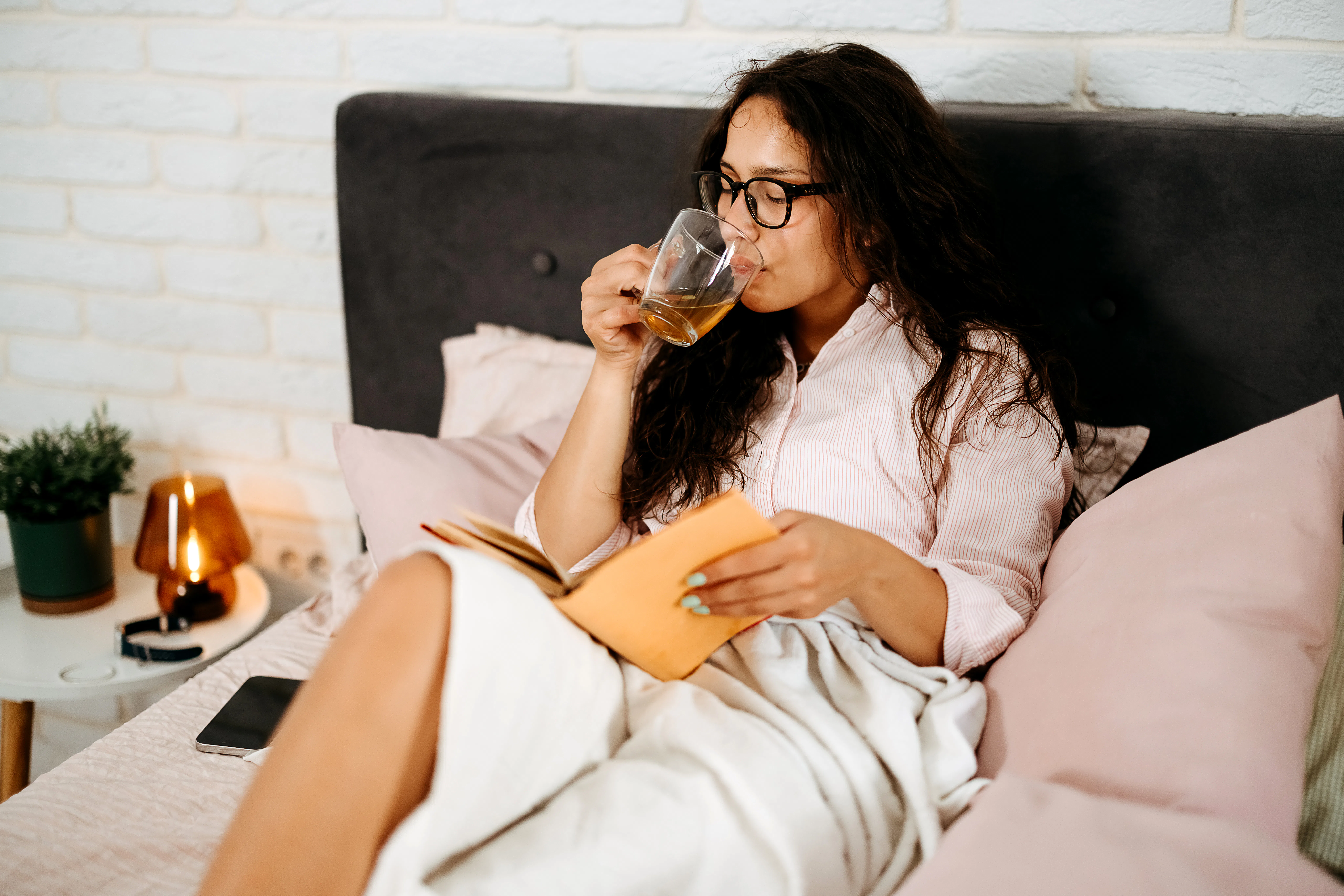 You Might Already Be Doing The Viral "Bedtime Stacking" Trend Without Realizing