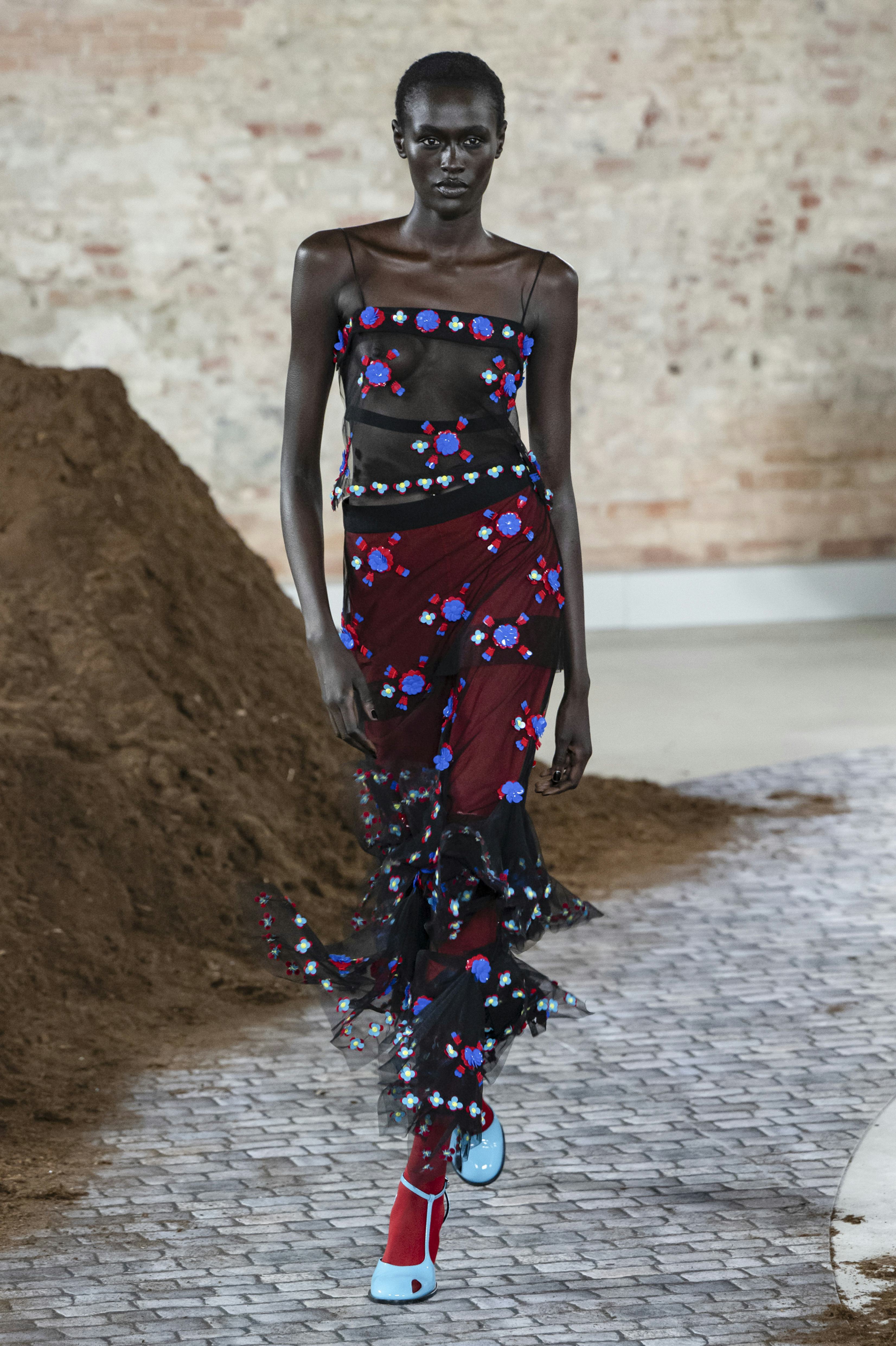 A model walks the runway at the Moschino Ready to Wear Fall/Winter 2026/2027 fashion show during the...