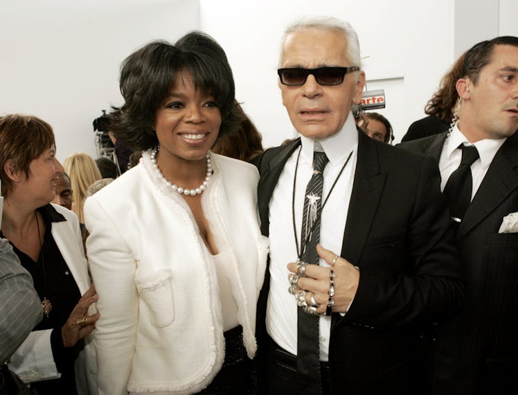 PARIS - JULY 7: Oprah Winfrey with Karl Lagerfeld attend the Chanel Spring/Summer 2005 Fashion Show...