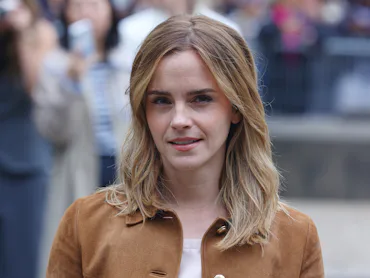 Emma Watson sparked dating rumors by kissing Gonzalo Hevia Baillères.