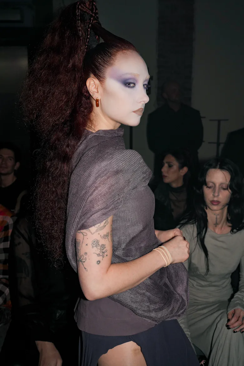 chappell roan black dress Chappell Roan steps out in a sheer black ensemble for the Alexander McQueen fashion show during Paris Fashion Week. Later, she filmed some of the photographers who were taking her photo when
