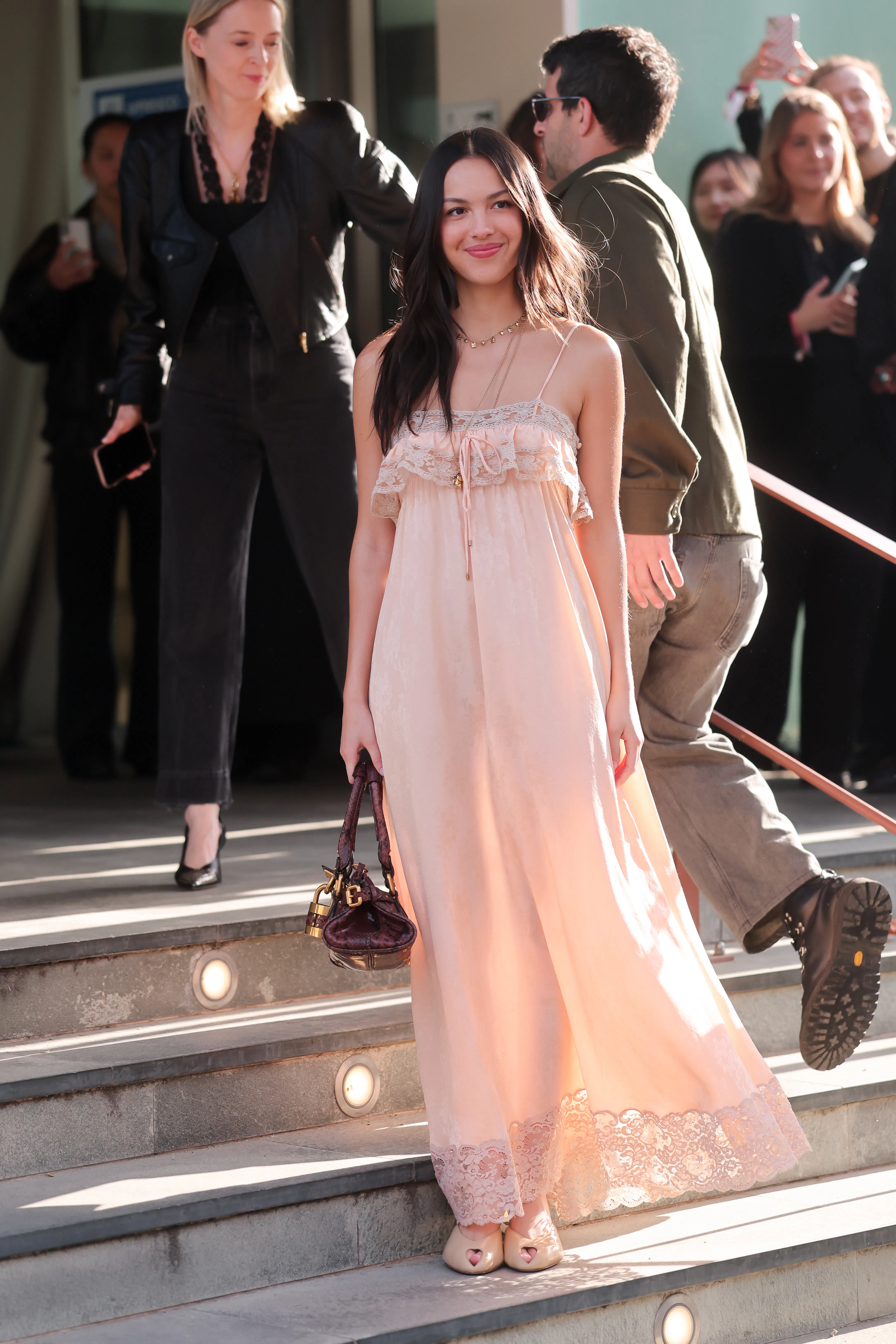 olivia rodrigo pink and black dress Olivia Rodrigo rocks bow-covered corset at 'Driving Home 2 U' premiere