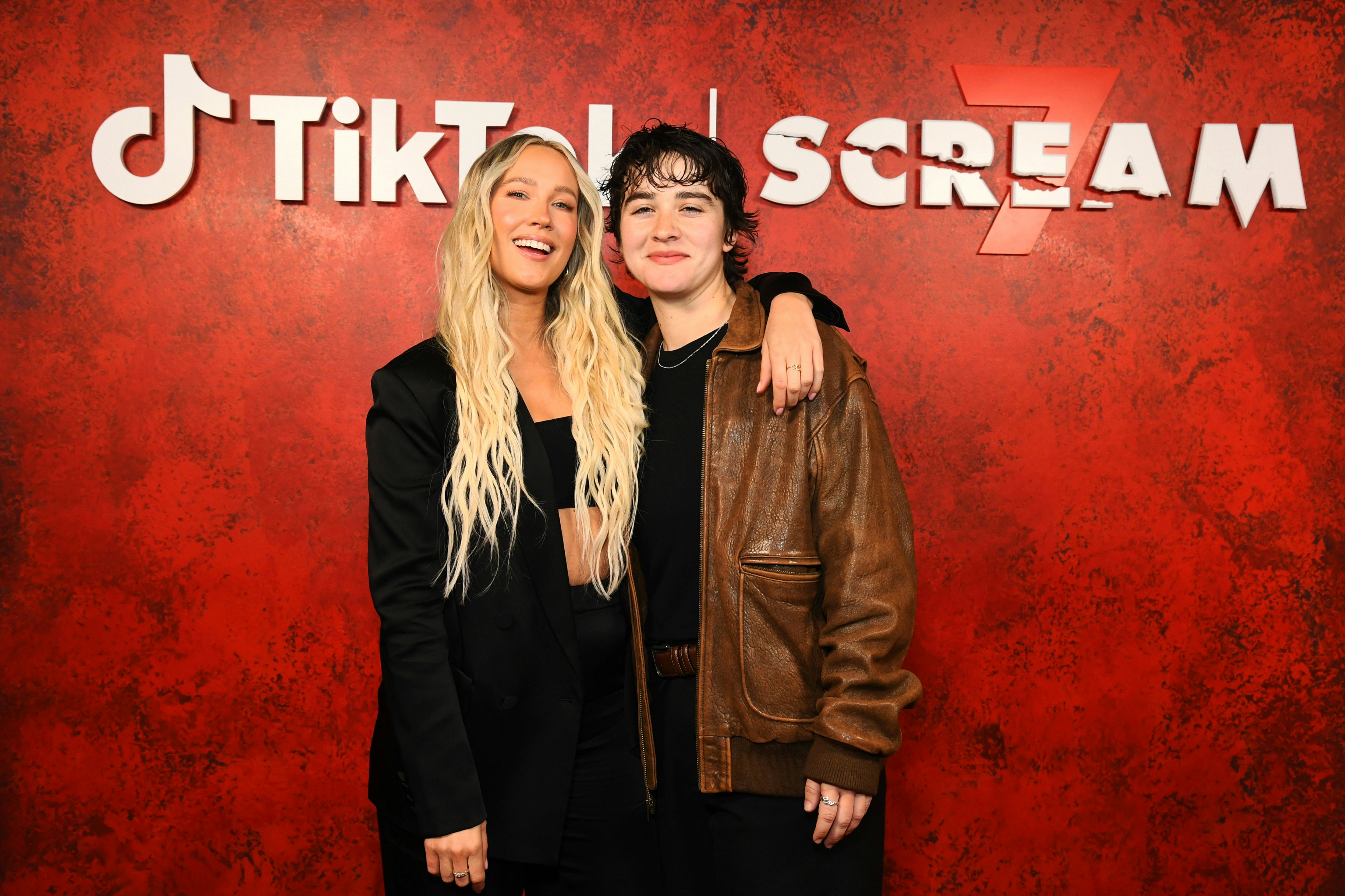 LOS ANGELES, CALIFORNIA - FEBRUARY 13: (L-R) Anna Camp and Jade Whipkey attend the "Scream 7" x TikT...