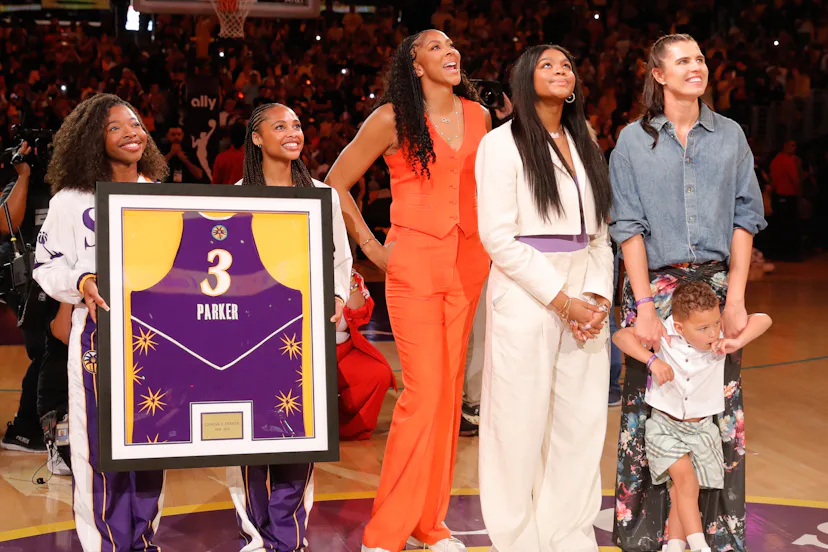 Former Los Angeles Sparks player Candace Parker smiles for her Jersey Retirement ceremony standing h...