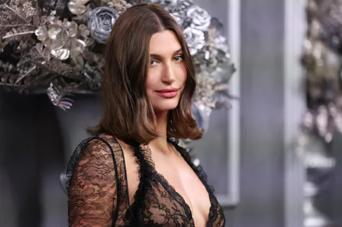 Hailey Bieber wore a yellow and pink slip dress.