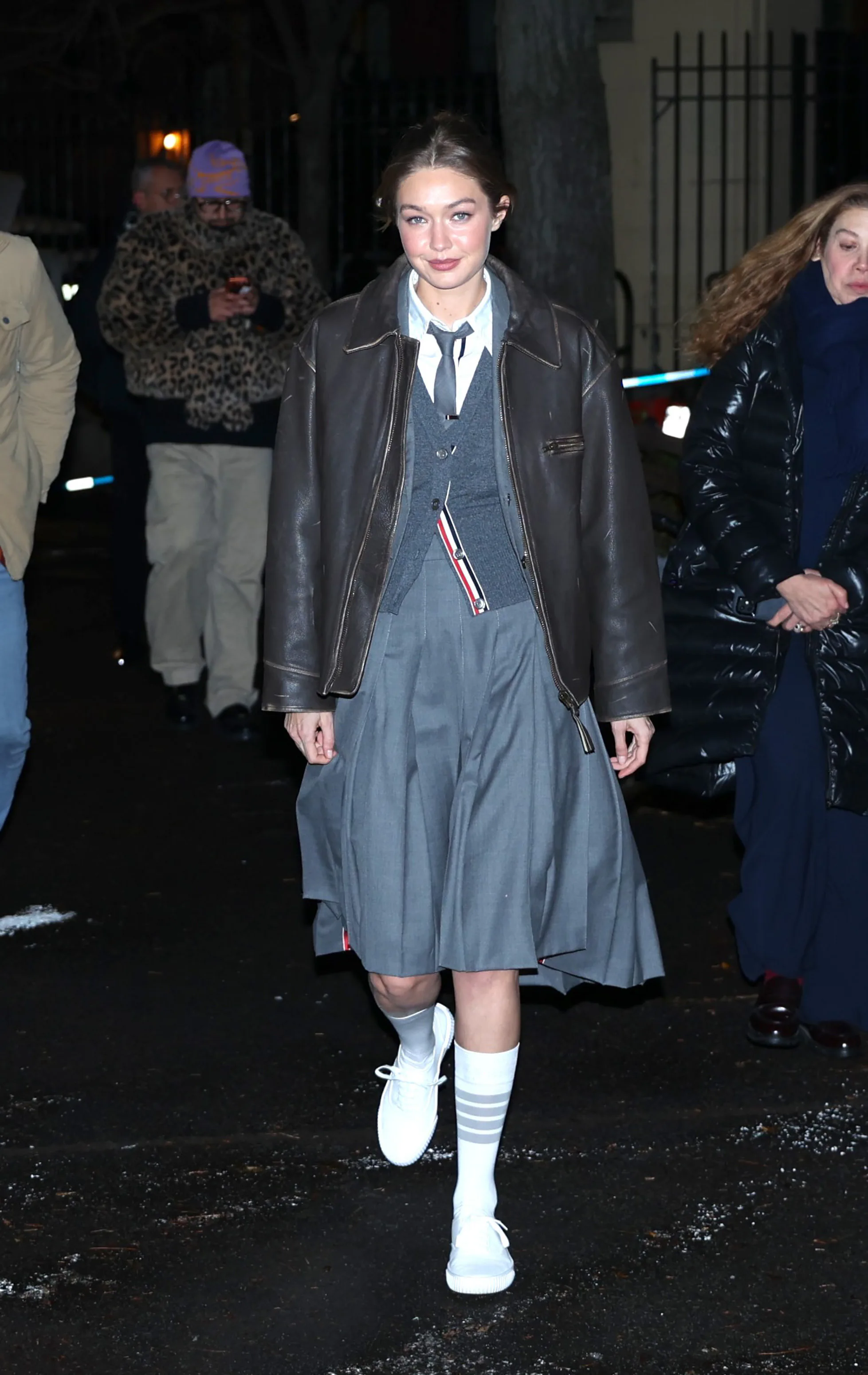 NEW YORK, NY - DECEMBER 16: Gigi Hadid is seen filming a commercial for "GQ Bowl x Tom Browne" on De...