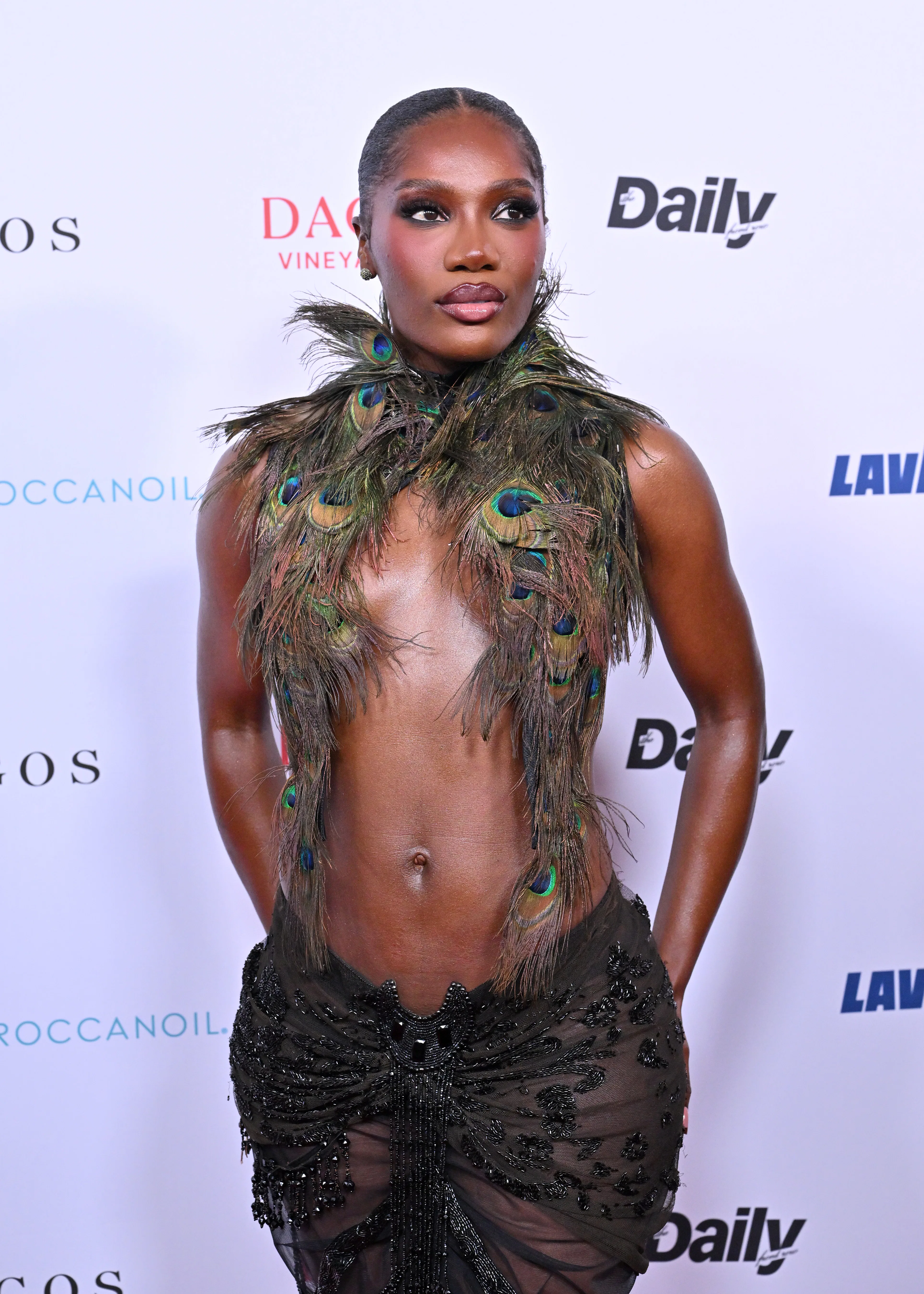 Doechii Takes Peacocking To New Heights With a Sultry Top